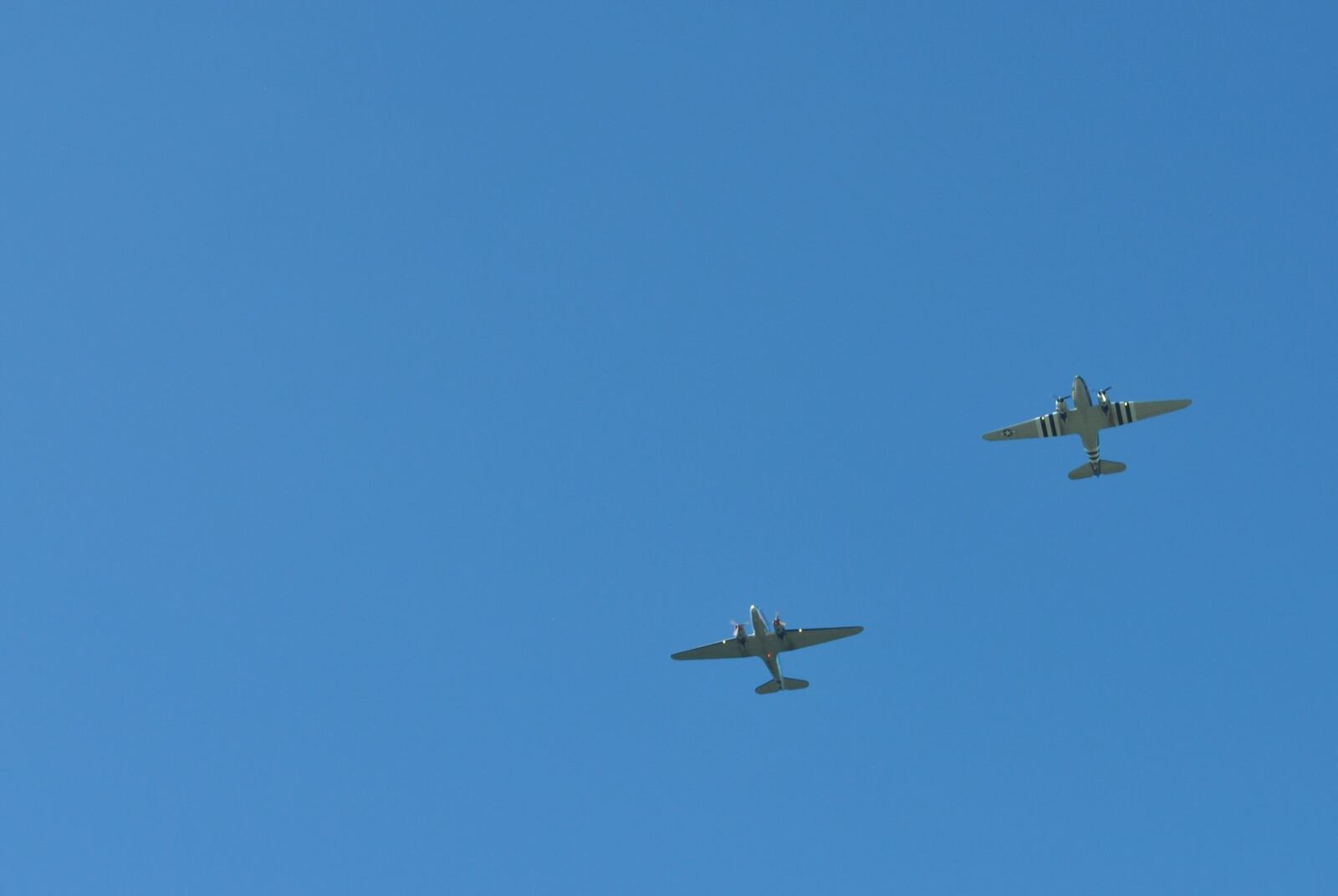 A C-47 “Sky King” that dropped 18 Paratroopers during D-Day along with a C-47A that transported cargo and paratroopers will flew past the Air Force Museum on Thursday as part of commemoration events celebrating the 75th anniversary of D-Day. The “Sky King” is from the Mid America Flight Museum in Mt. Pleasant, Texas and the C-47A is from Vintage Wings in Terre Haute, Indiana.