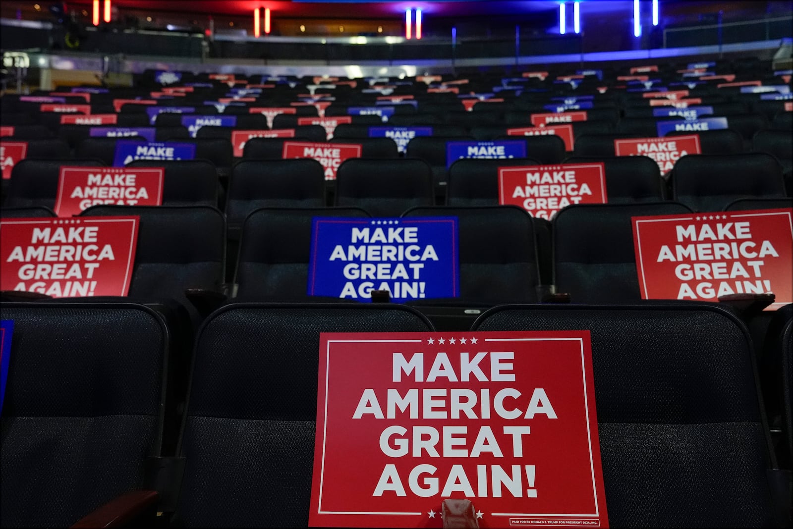 Signs are placed in seats before Republican presidential nominee former President Donald Trump speaks at a campaign rally at Madison Square Garden, Sunday, Oct. 27, 2024, in New York. (AP Photo/Julia Demaree Nikhinson)