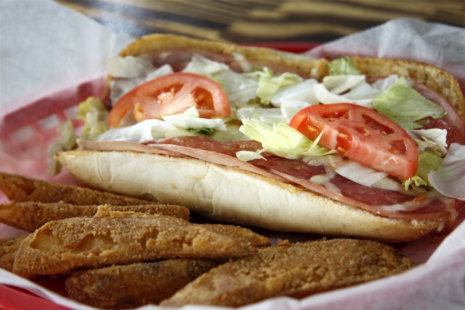 The 'deluxe sub' made with ham, salami, pepperoni, cheese, lettuce, tomatoe and Italian dressing is on the menu at Gionino's Pizzeria. The store opened its first Dayton location at 1528 E. Third St. The franchise, owned by Tony Clark, has about 45 locations between Cleveland and Canton, with a Columbus location as well. LISA POWELL / STAFF