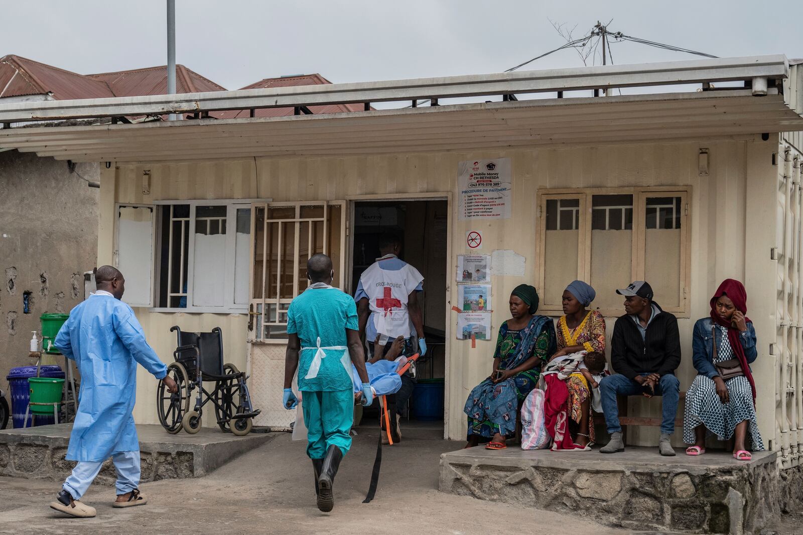 A person wounded in the fighting between M23 rebels and Congolese armed forces arrives at the Cbeca Ndosho hospital in Goma, Democratic Republic of the Congo, Thursday, Jan. 23, 2025. (AP Photo/Moses Sawasawa)