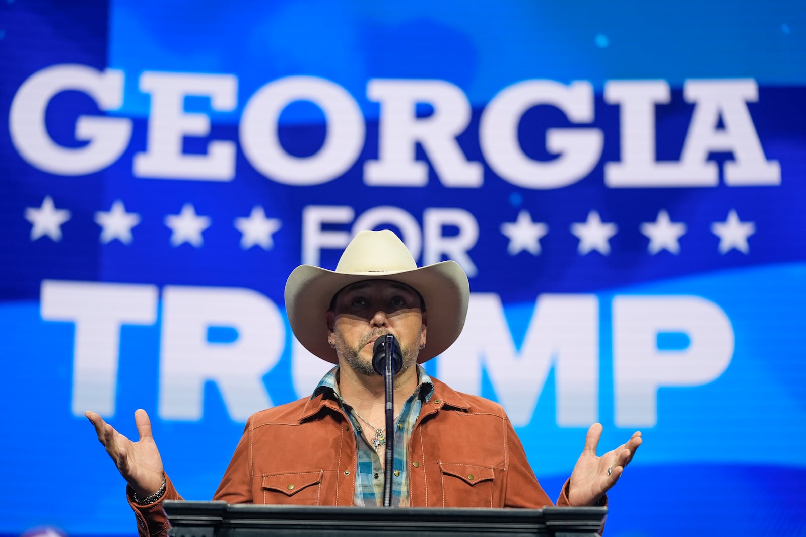 FILE - Country music singer Jason Aldean speaks before Republican presidential nominee former President Donald Trump at a Turning Point Action campaign rally, Oct. 23, 2024, in Duluth, Ga. (AP Photo/Alex Brandon, File)