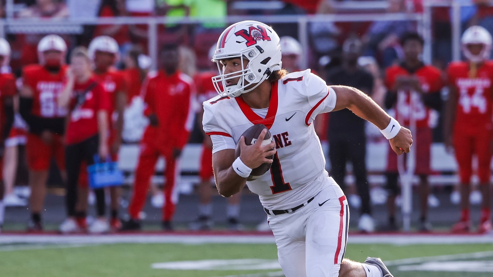 Wayne quarterback Tyrell Lewis carries the ball during their game against Fairfield. Wayne defeated Fairfield 31-13 on opening night of high school football Friday, Aug. 23, 2024 at Fairfield Alumni Stadium. NICK GRAHAM/STAFF