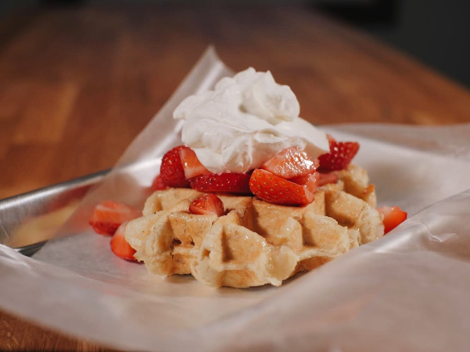 Ironworks Waffle Cafe will serve a liege waffle with whipped cream and strawberries at COhatch The Market. Submitted Photo/Thomas Miller