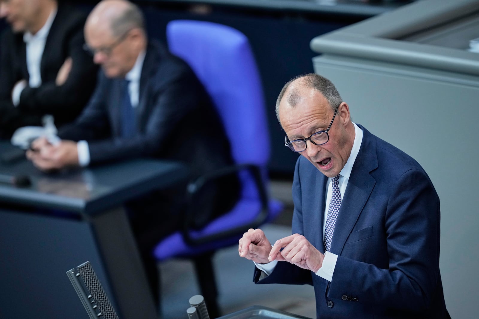 German opposition leader and Christian Democratic Union party chairman Friedrich Merz speaks during a debate and voting about loosen the country's debt rules and change constitution in the German Parliament Bundestag in Berlin, Germany, Tuesday, March 18, 2025. (AP Photo/Ebrahim Noroozi)