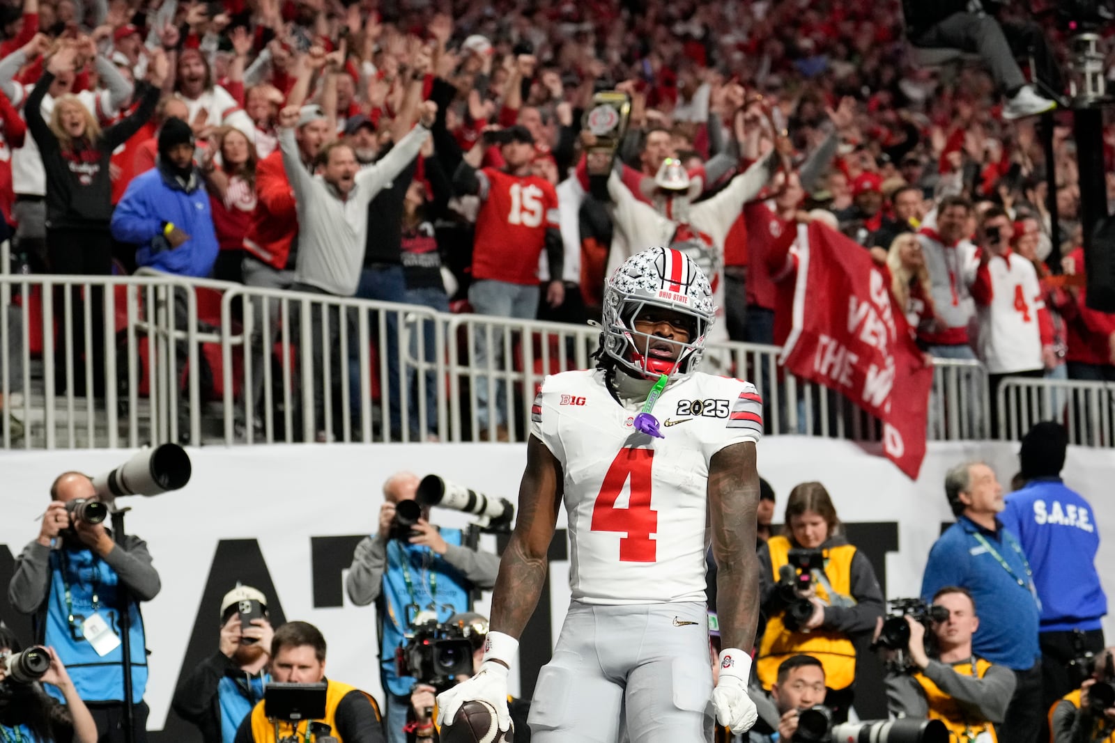 Ohio State wide receiver Jeremiah Smith celebrates after scoring against Notre Dame during first half of the College Football Playoff national championship game Monday, Jan. 20, 2025, in Atlanta. (AP Photo/Brynn Anderson)