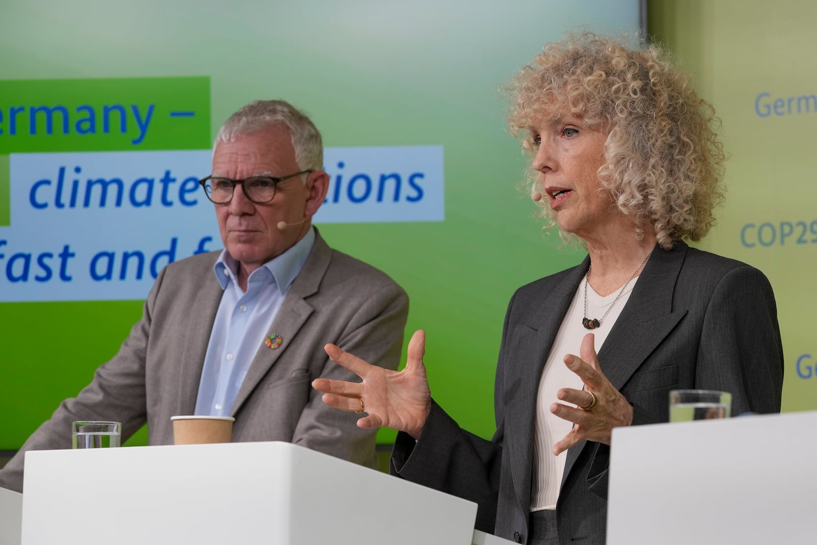 State secretary in Germany's economic cooperation ministry Jochen Flasbarth, left, and Jennifer Morgan, Germany climate envoy, attend a news conference at the COP29 U.N. Climate Summit, Thursday, Nov. 14, 2024, in Baku, Azerbaijan. (AP Photo/Sergei Grits)