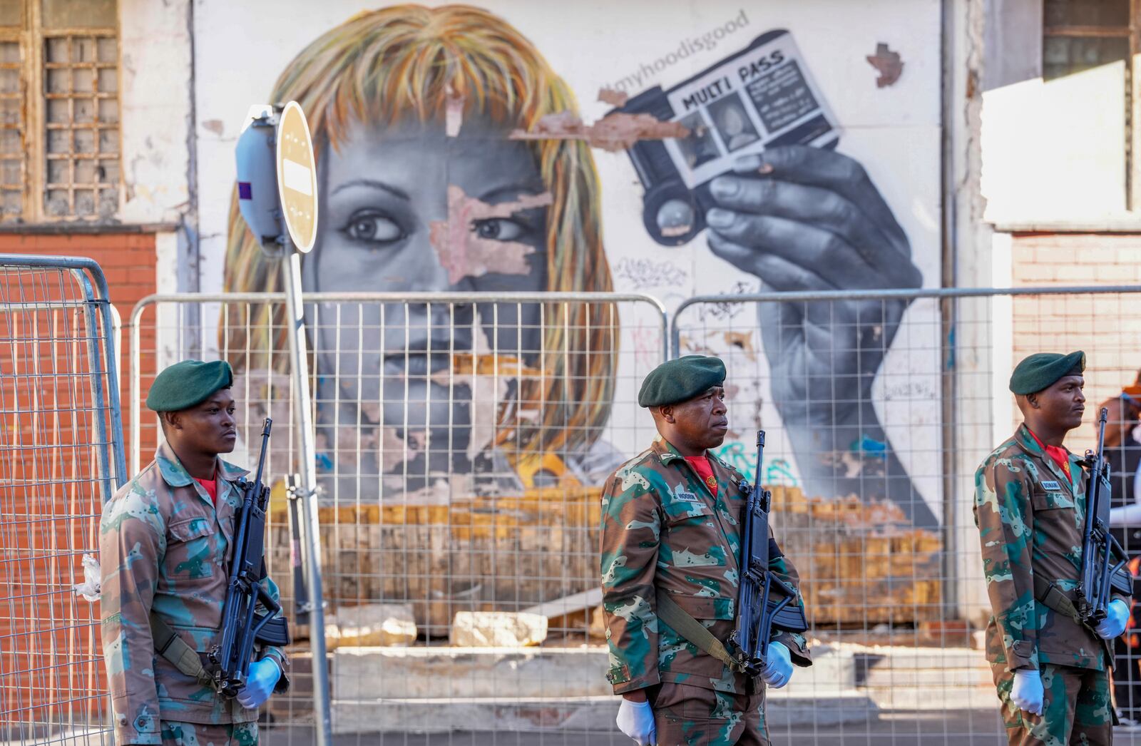 South African soldiers line the street leading to Cape Town's city hall where South African President Cyril Ramaphosa delivers his annual state of the union address, Thursday, Feb. 6, 2025. (AP Photo/Nardus Engelbrecht)