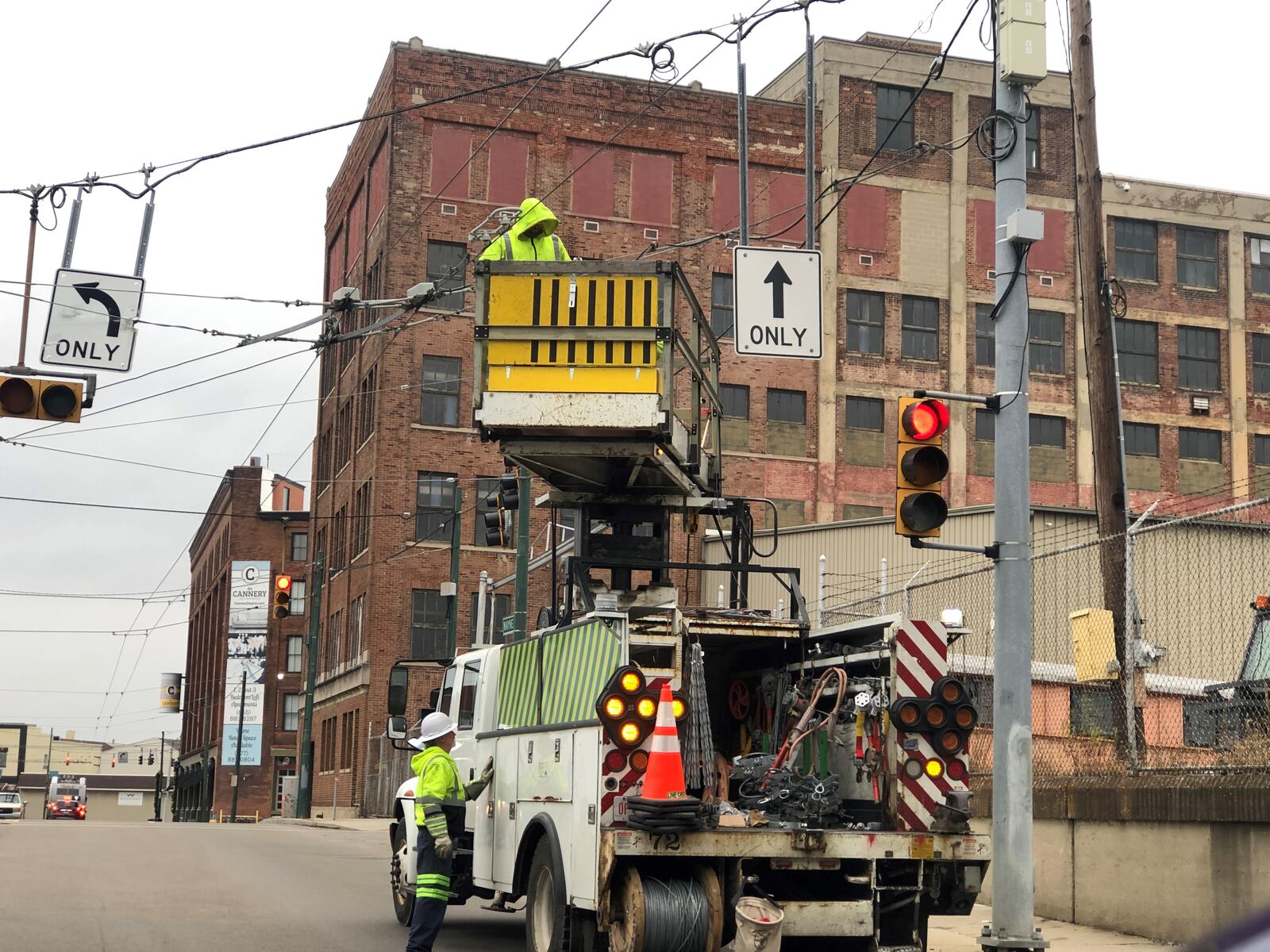 RTA crews work on trolley bus lines near the Oregon District. CORNELIUS FROLIK / STAFF