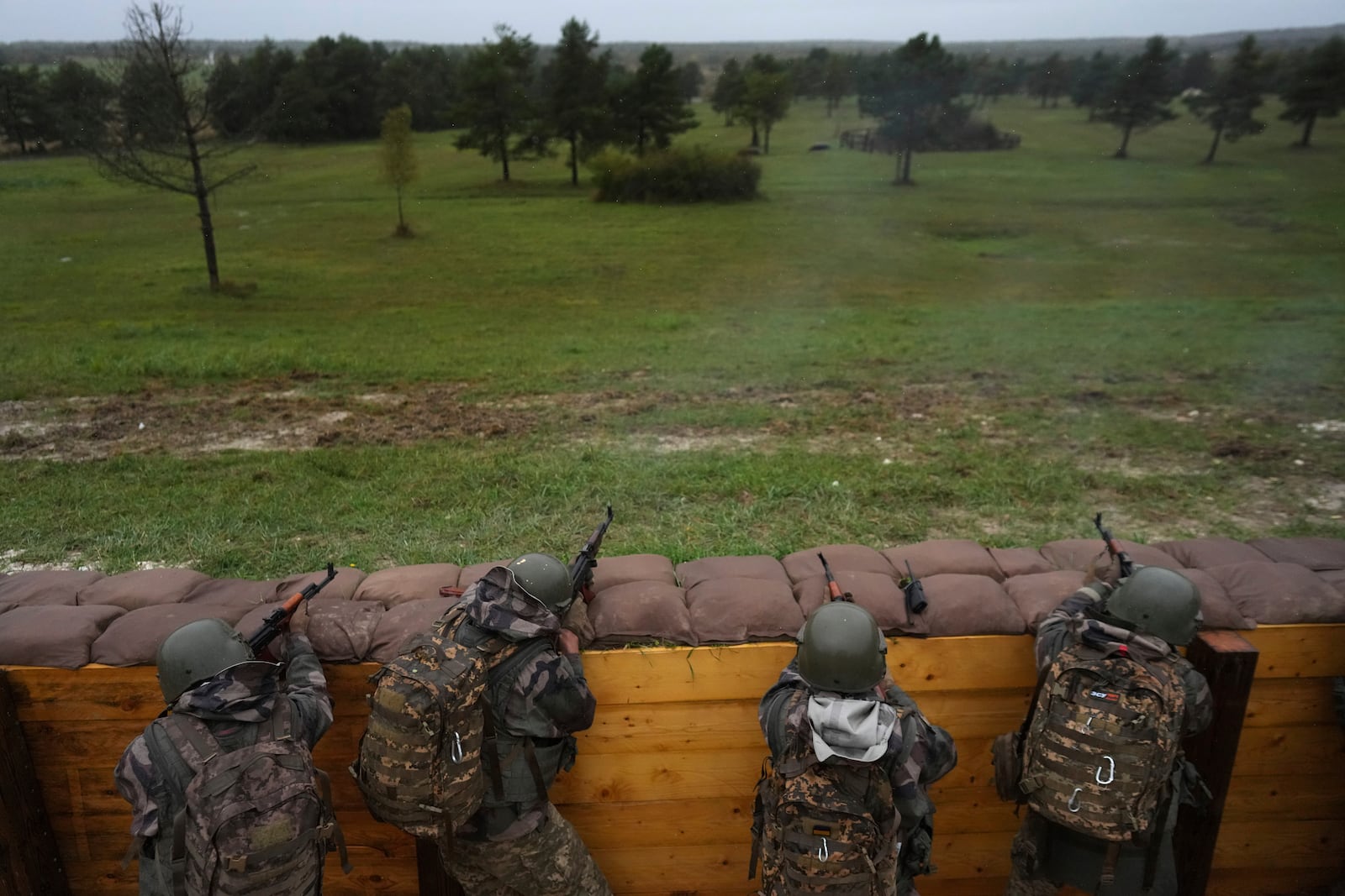 FILE - Ukrainian soldiers train at a military camp in eastern France, Wednesday, Oct. 9, 2024. (AP Photo/Thibault Camus, Pool, File)