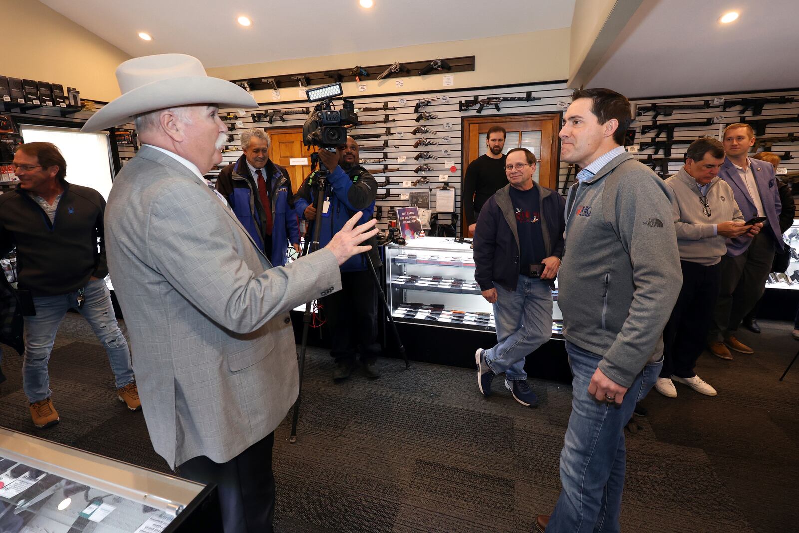 Ohio Secretary of State and Republican candidate for U.S. Senate Frank LaRose, right, talks with Butler County Sheriff Richard K. Jones, a Republican running for re-election, during a campaign event in Hamilton, Ohio, Monday, March 18, 2024. (AP Photo/Paul Vernon)