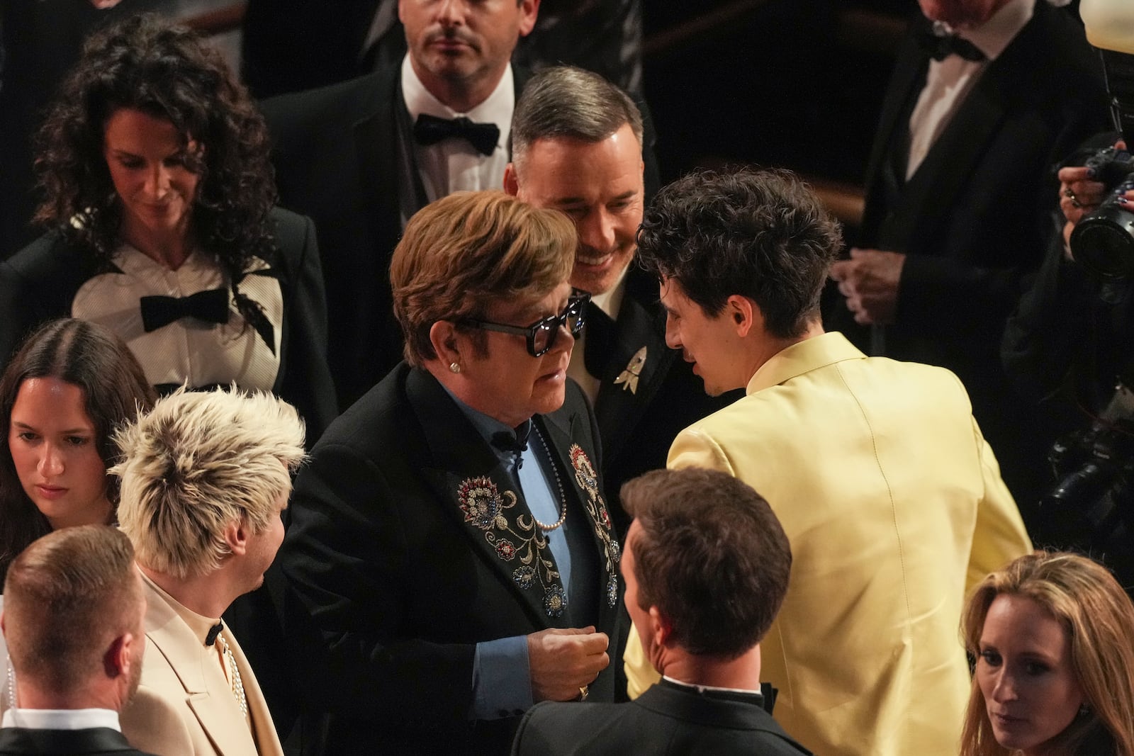 Elton John, left, and Timothee Chalamet in the audience during the Oscars on Sunday, March 2, 2025, at the Dolby Theatre in Los Angeles. (AP Photo/Chris Pizzello)