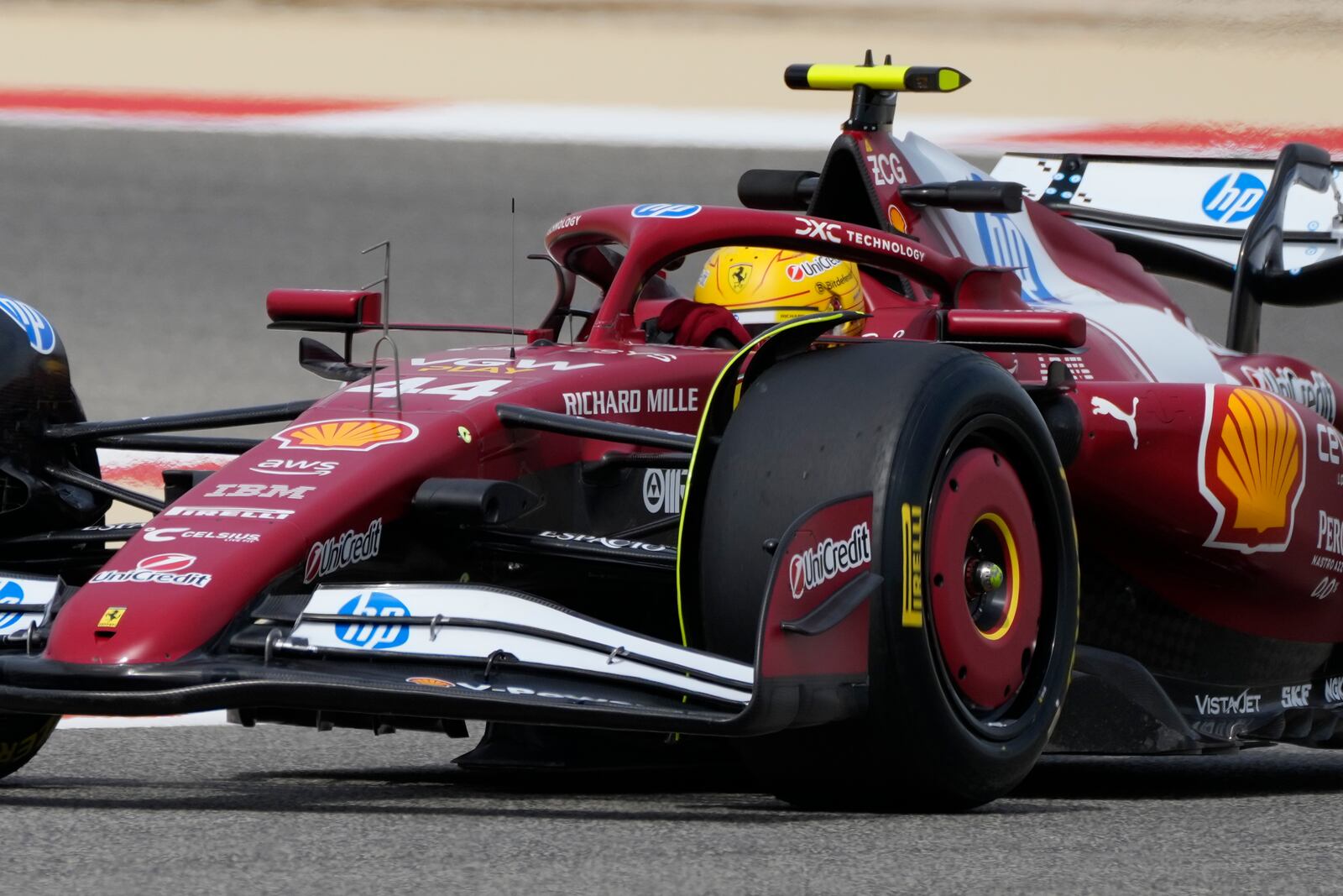 Ferrari driver Lewis Hamilton of Britain in action during a Formula One pre-season test at the Bahrain International Circuit in Sakhir, Bahrain, Wednesday, Feb. 26, 2025. (AP Photo/Darko Bandic)