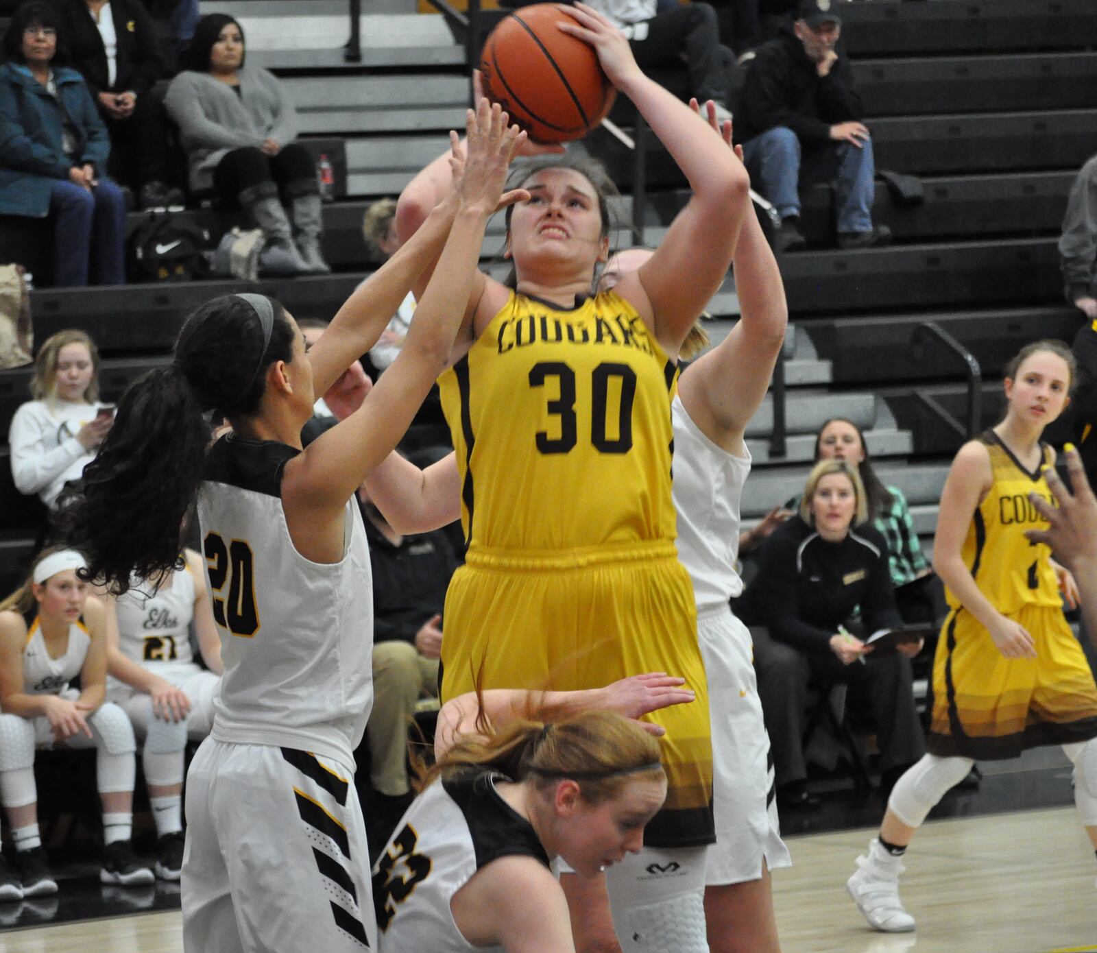 Mikala Morris (center) scored 29 points for Kenton Ridge, but Centerville still defended their home court with a 63-54 victory Jan. 4, 2018. NICK DUDUKOVICH / CONTRIBUTOR