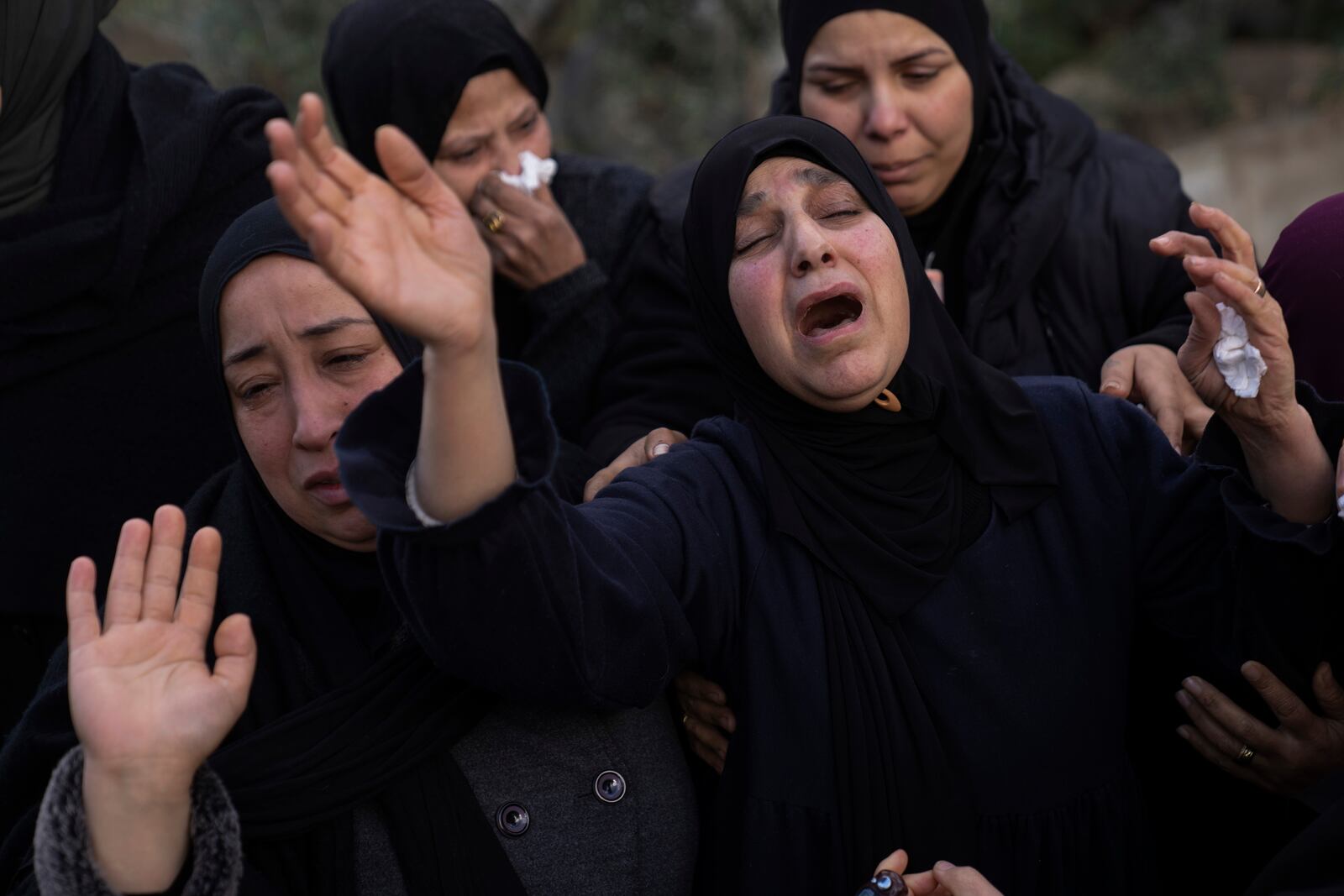 Relatives mourn the death of Palestinian Shatha al-Sabbagh, a 22-year-old journalism student, during her funeral in the Jenin refugee camp in the Israeli-occupied West Bank, Sunday, Dec. 29, 2024. (AP Photo/Majdi Mohammed)