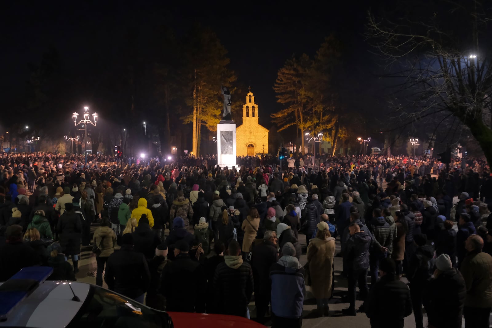 Several thousand people participated in a protest demanding the resignations of top security officials over a shooting earlier this week in Cetinje, outside of Podogrica, Montenegro, Sunday, Jan. 5, 2025. (AP Photo/Risto Bozovic)