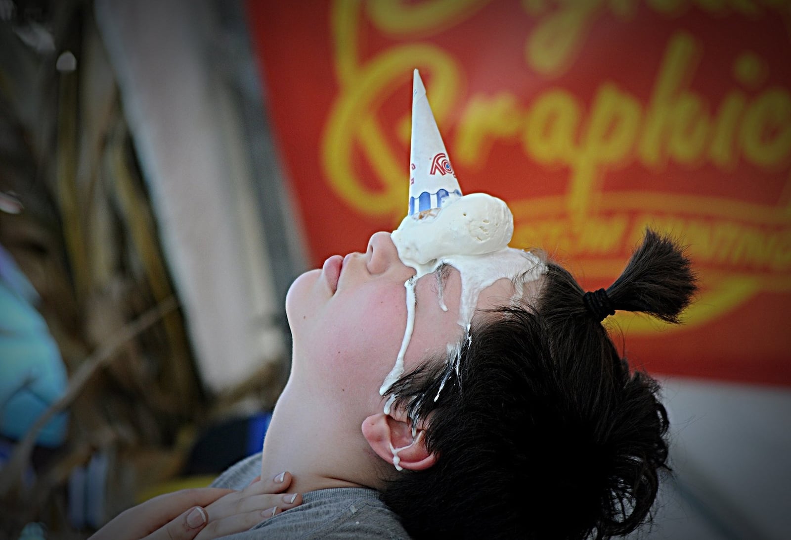 A child participates in the unicorn challenge at the New Carlisle Heritage of Flight Festival. The challenge was sponsored by Arrow Queen, which is celebrating its 50th season in business on Sunday. MARSHALL GORBY/STAFF