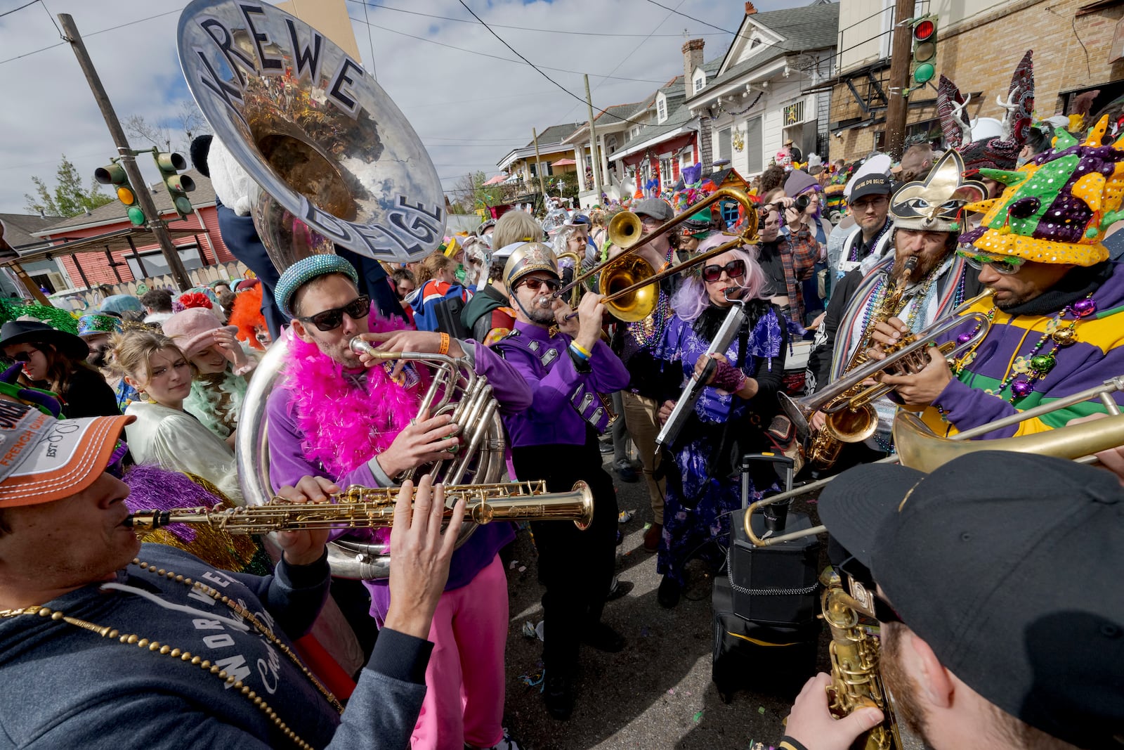 FILE - The Krewe du Belge plays during the Society of Saint Anne parade through Bywater and Marigny neighborhoods on Mardi Gras Day in New Orleans, Feb. 13, 2024. (AP Photo/Matthew Hinton, File)