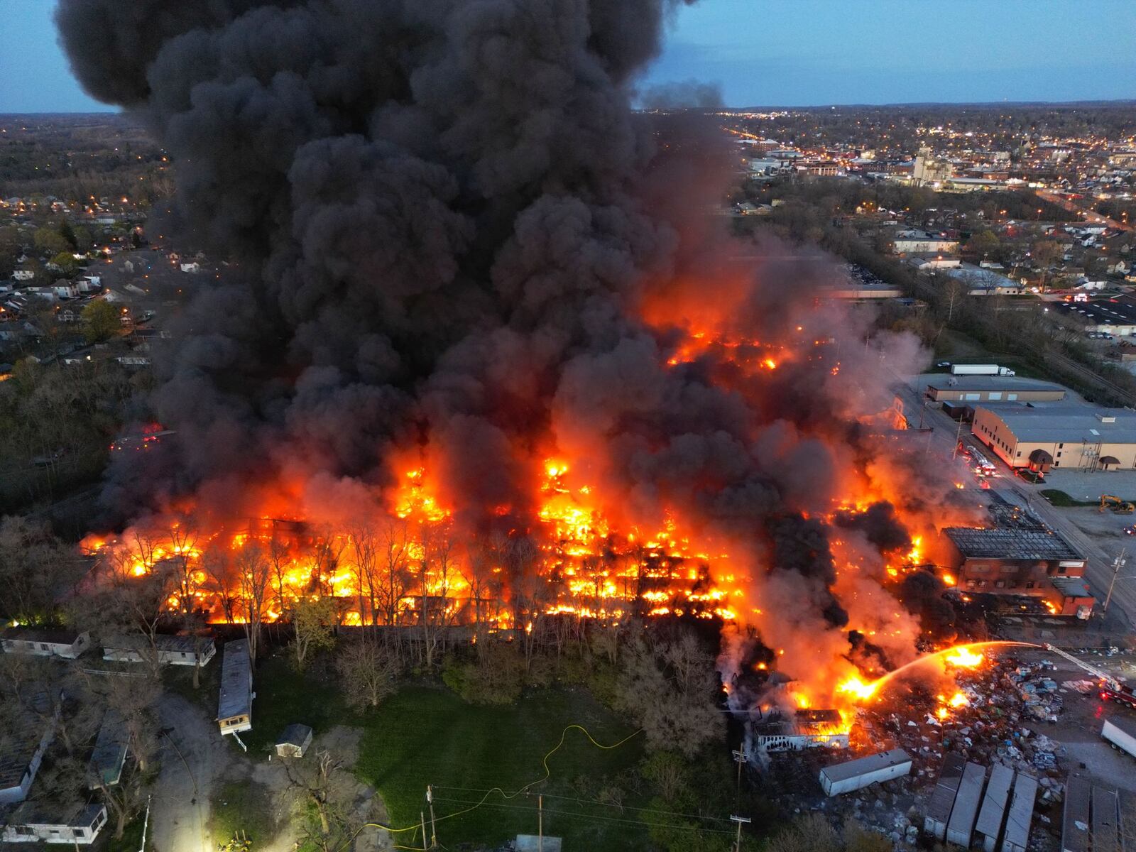 Crews battle a massive and toxic industrial fire Tuesday, April 11, 2023, at a recycling facility in Richmond, Indiana. NICK GRAHAM/STAFF