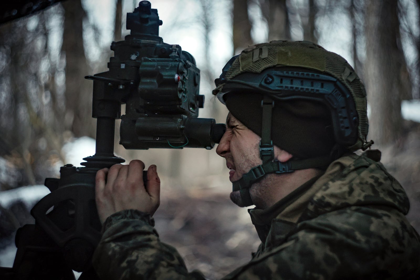 A Ukrainian serviceman prepares to fire a M777 howitzer towards Russian positions at the frontline near Donetsk, Ukraine, Monday, March 3, 2025. (AP Photo/Roman Chop)