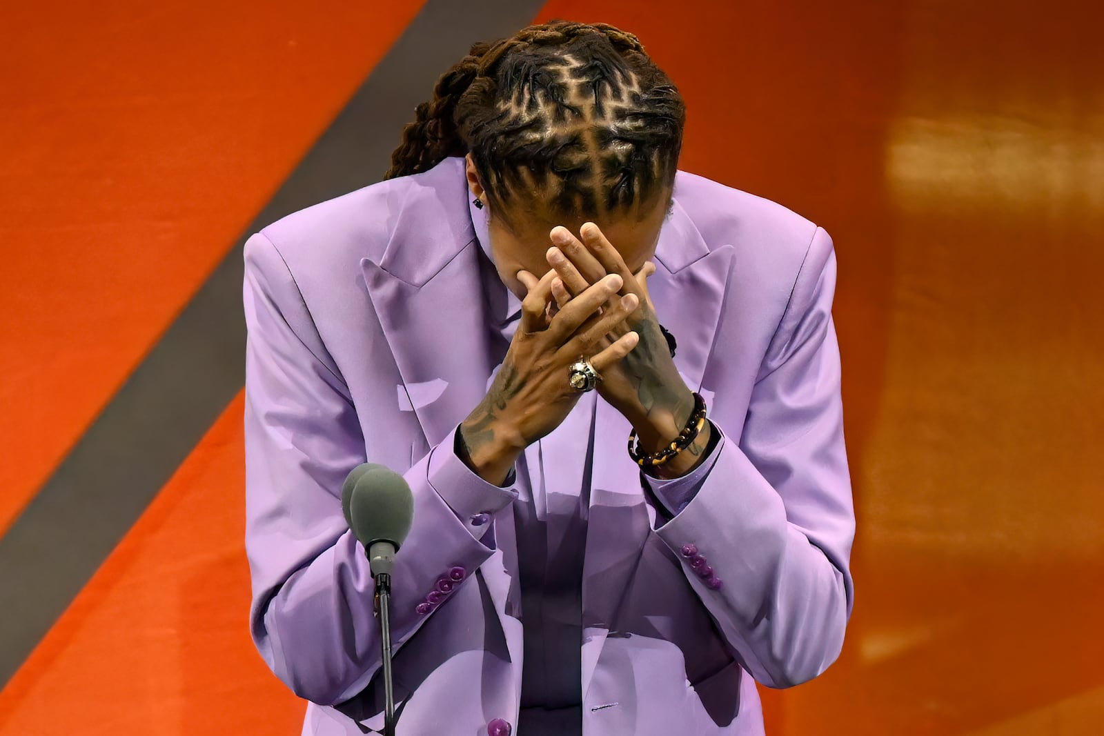 Seimone Augustus reacts during her enshrinement in the Basketball Hall of Fame, Sunday Oct. 13, 2024, in Springfield, Mass. (AP Photo/Jessica Hill)