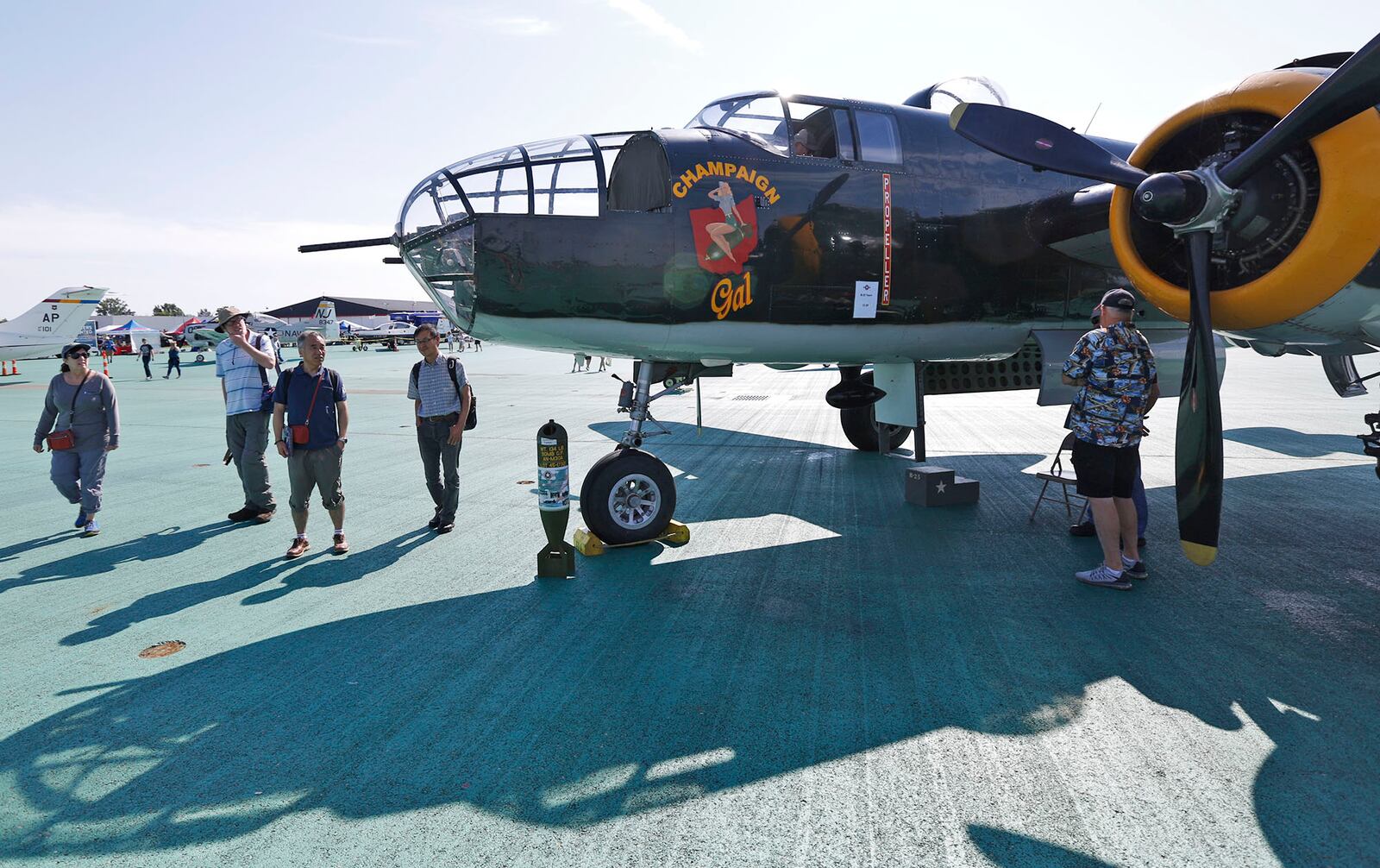 WWII era B-25 Mitchell bomber named Champaign Gal from Urbana on Sunday at the Vectren Dayton Air Show.  TY GREENLEES / STAFF