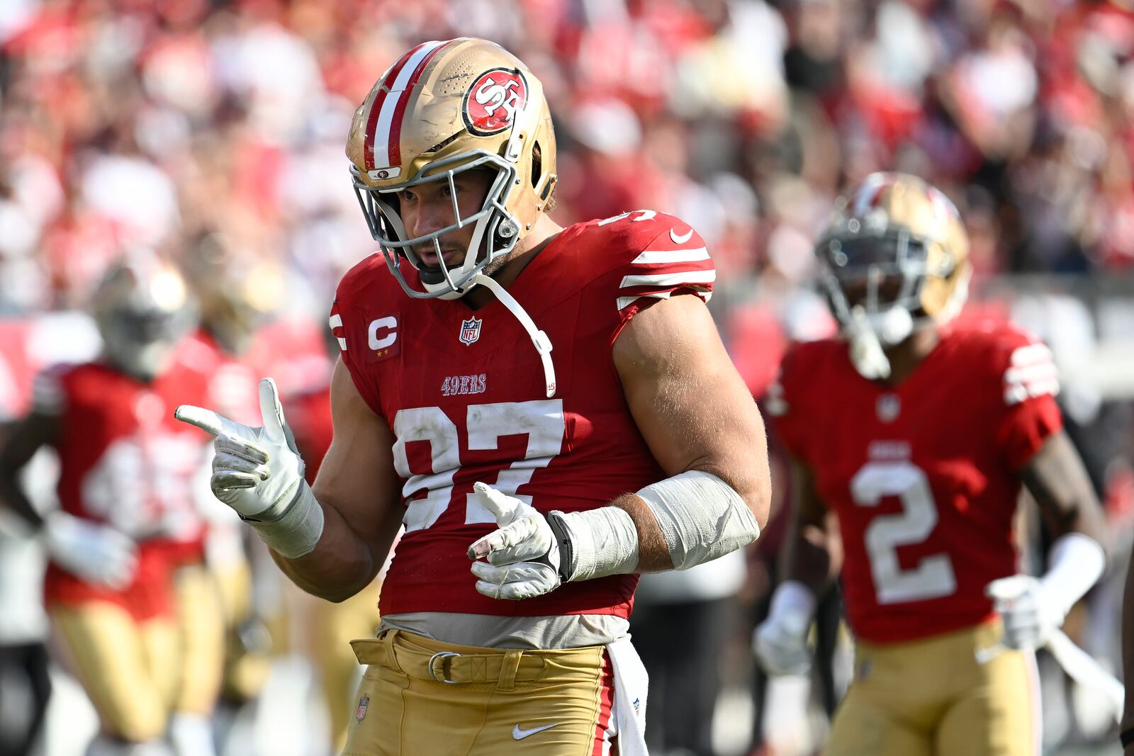 San Francisco 49ers defensive end Nick Bosa (97) celebrates after sacking Tampa Bay Buccaneers quarterback Baker Mayfield during the second half of an NFL football game in Tampa, Fla., Sunday, Nov. 10, 2024. (AP Photo/Jason Behnken)