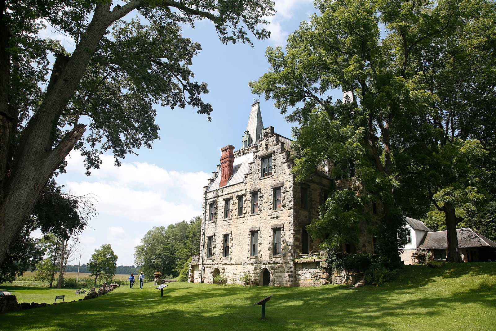 The grounds of the Piatt Castles in West Liberty are the sight of community events, Shakespeare plays and weddings. Interpretive signs guide visitors through the history of the Piatt family. Pictured is Mac-O-Chee, a 8,000 square-foot-home built by Donn Piatt. LISA POWELL / STAFF