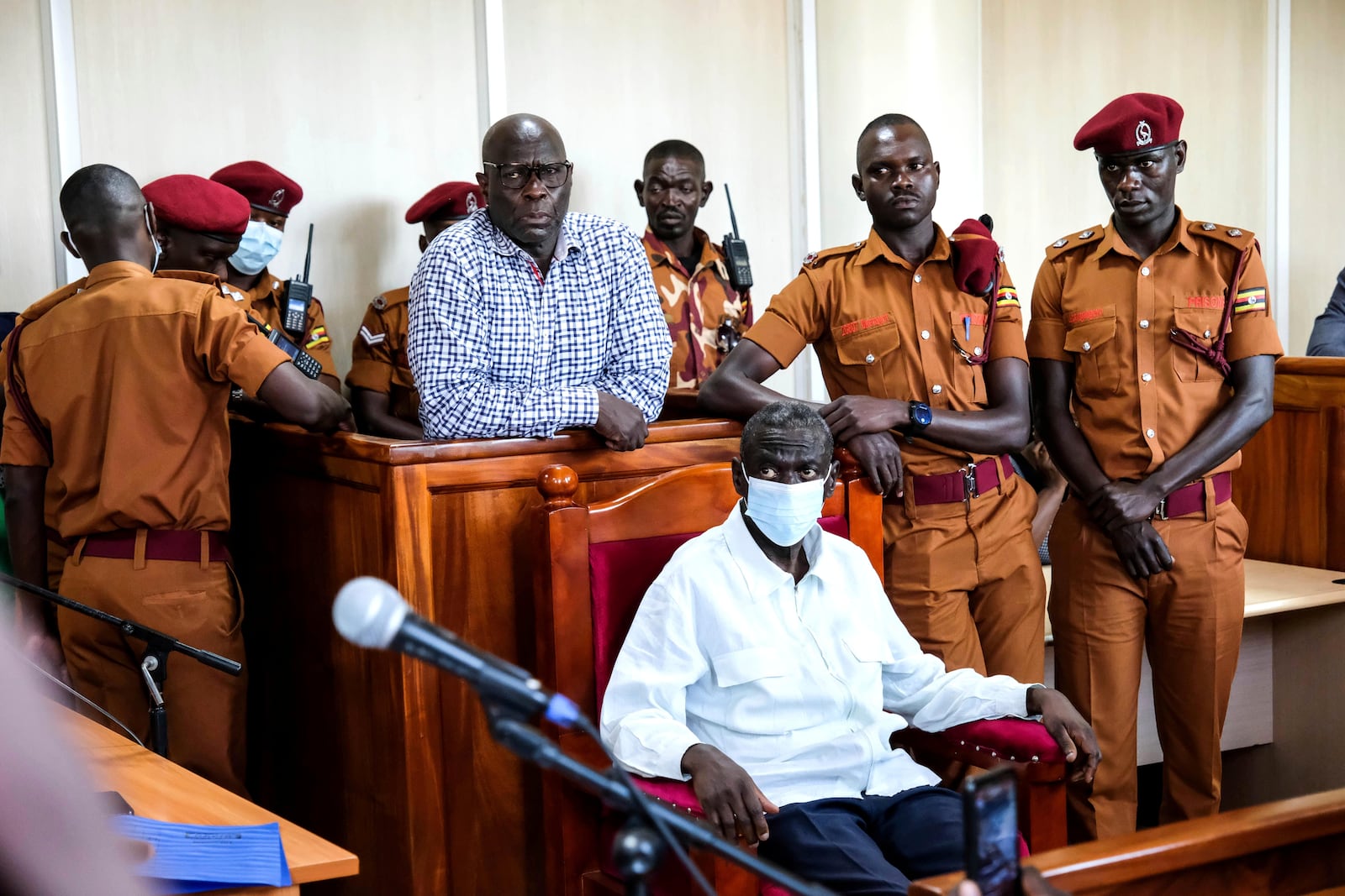 Ugandan opposition leader and four-time presidential candidate Kizza Besigye appears in a civilian court as attorneys tried to secure his freedom, but a judge said he was too unwell to follow proceedings in Kampala, Uganda Wednesday, Feb. 19, 2025. (AP Photo/Hajarah Nalwadda)