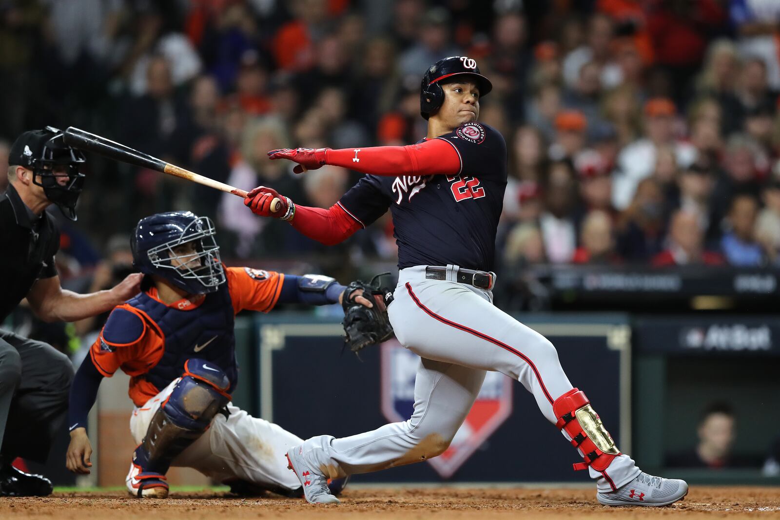 HOUSTON, TEXAS - OCTOBER 30:  Juan Soto #22 of the Washington Nationals hits an RBI single against the Houston Astros during the eighth inning in Game Seven of the 2019 World Series at Minute Maid Park on October 30, 2019 in Houston, Texas. (Photo by Elsa/Getty Images)