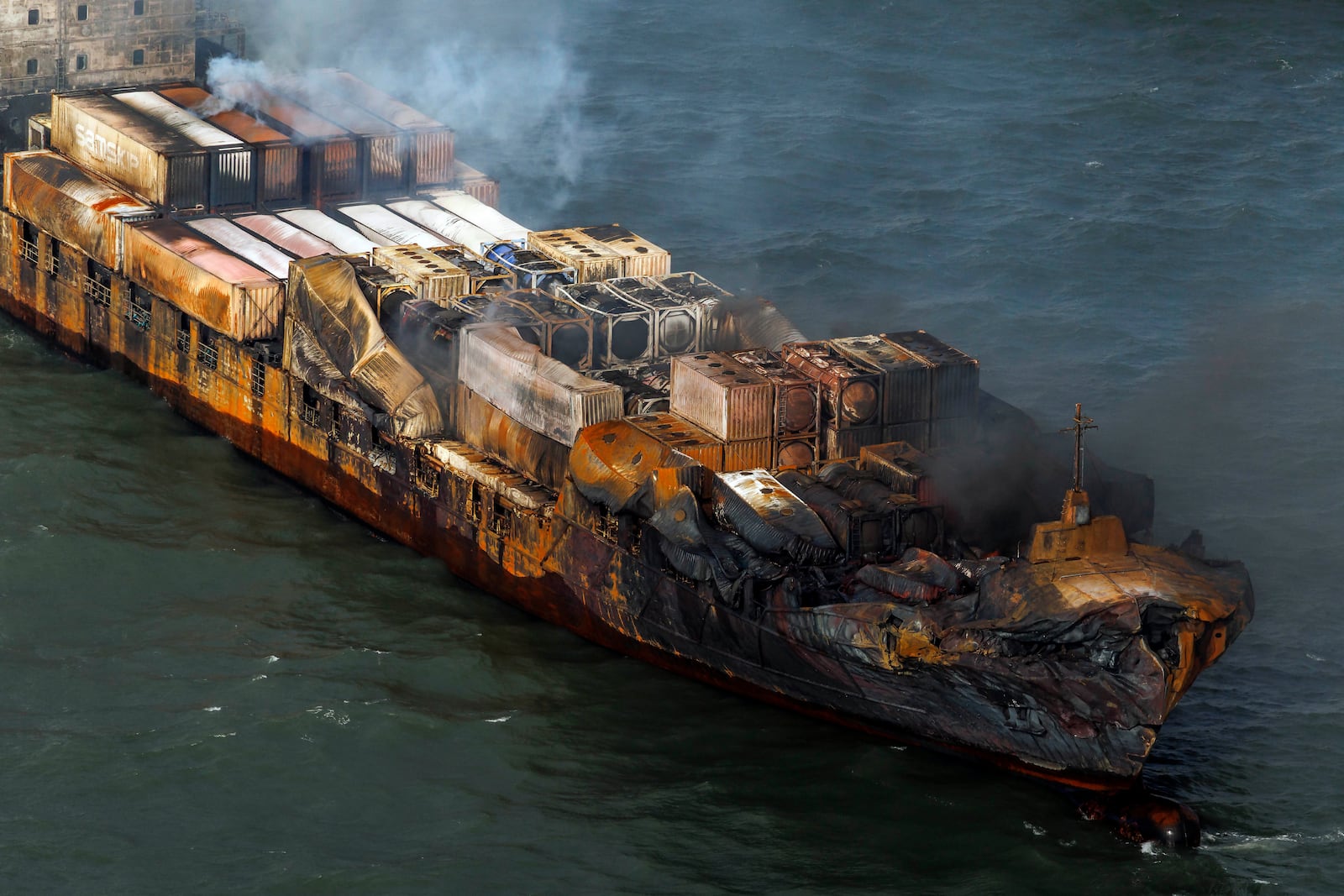 Smoke billows from the MV Solong cargo ship in the North Sea, off the Yorkshire coast in England, Tuesday, March 11, 2025. (Dan Kitwood/Pool Photo via AP)