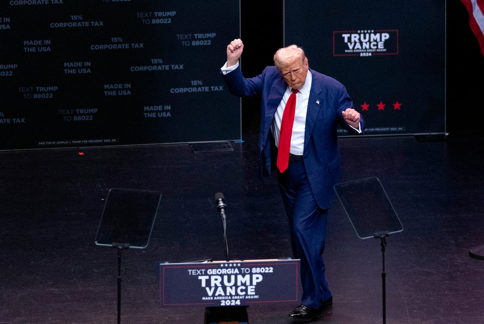 Republican presidential nominee former President Donald Trump dances after speaking at a campaign event Tuesday, Sept. 24, 2024, in Savannah, Ga. (AP Photo/John Bazemore)