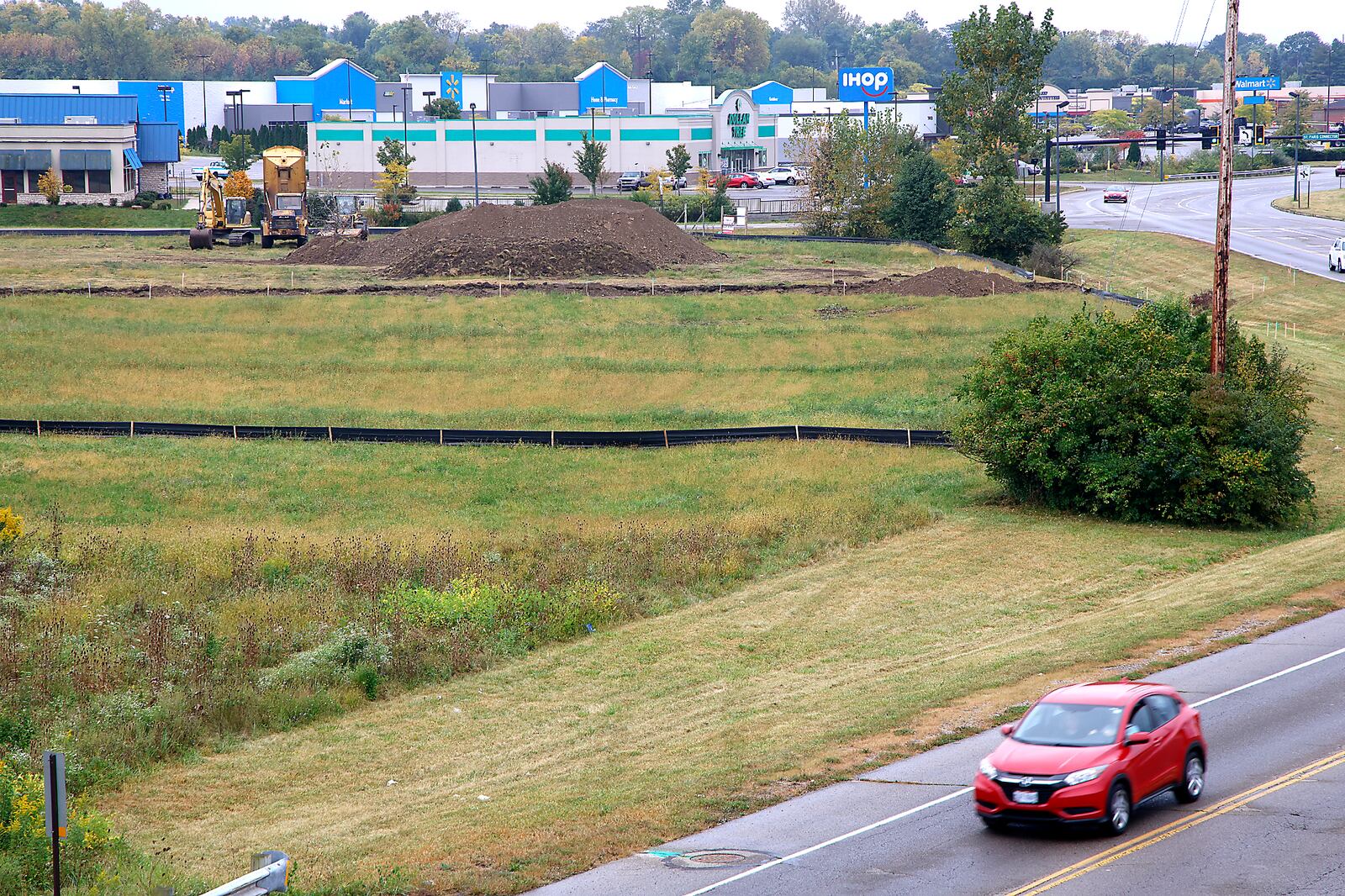 The site is being prepped for a new hotel at the intersection of Bechtle Avenue and St. Paris Pike Thursday, Sept. 28, 2023. BILL LACKEY/STAFF