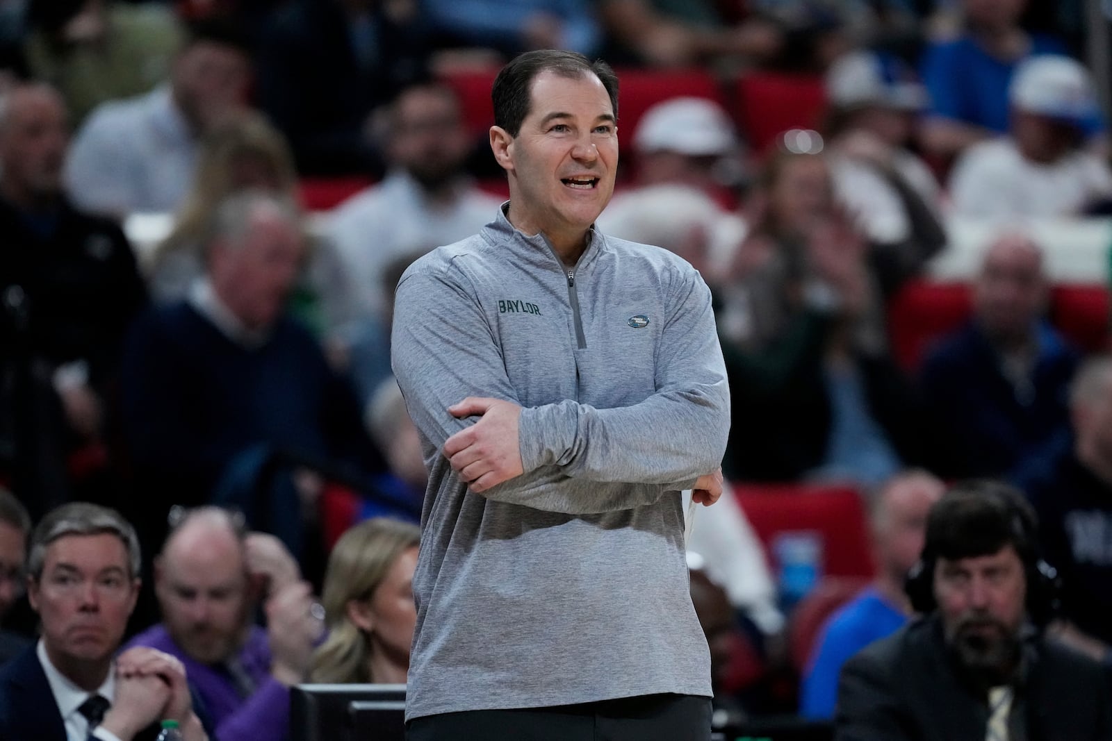 Baylor head coach Scott Drew watches during the first half in the first round of the NCAA college basketball tournament against Mississippi State, Friday, March 21, 2025, in Raleigh, N.C. (AP Photo/Stephanie Scarbrough)