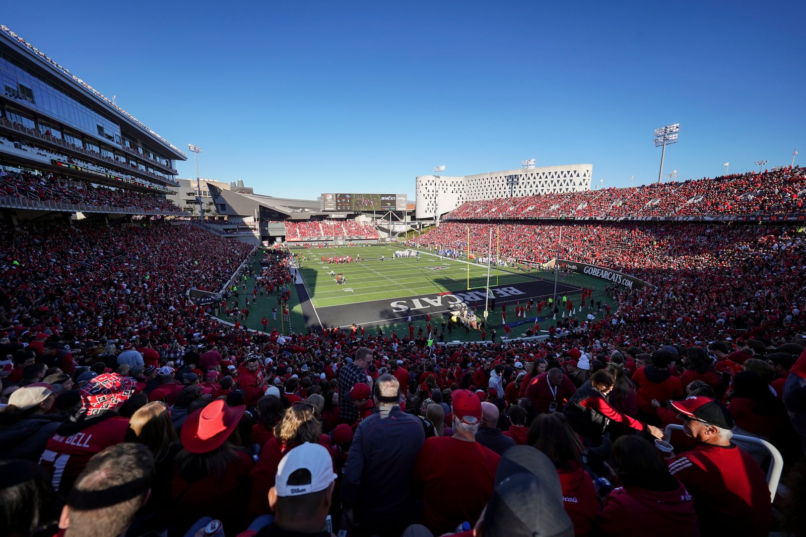 Fans fill Nippert Stadium during the first half of an NCAA college football game between Cincinnati and Tulsa Saturday, Nov. 6, 2021, in Cincinnati. (AP Photo/Jeff Dean)