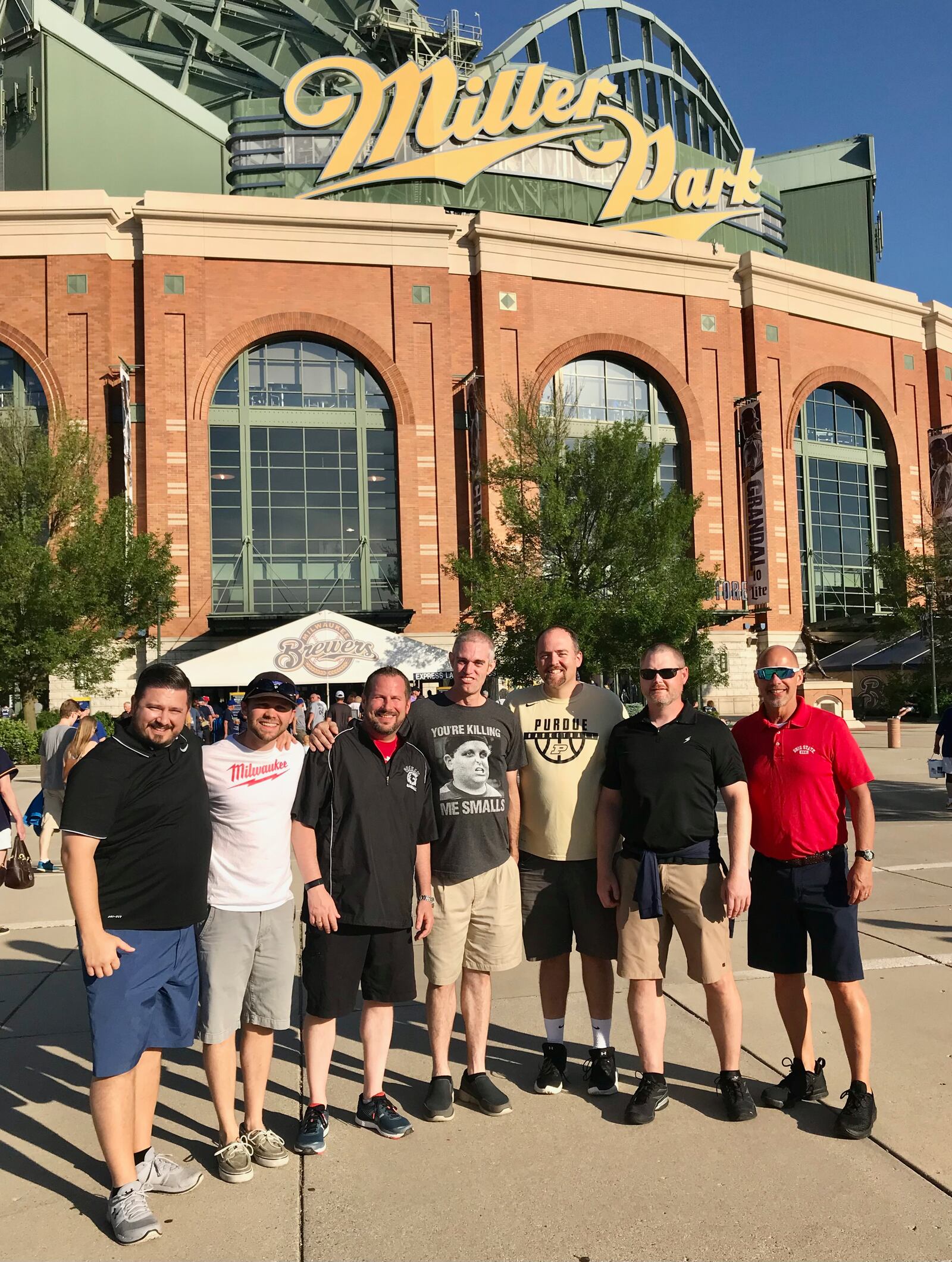 Brent Parke, center in grey shirt, and friends visit Miller Park in Milwaukee in 2019.