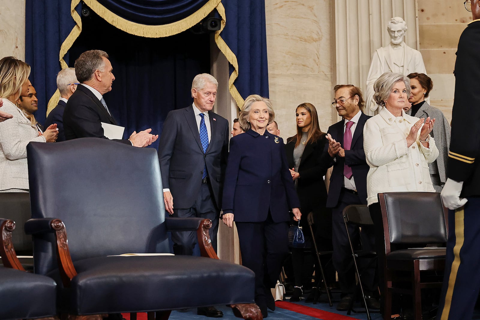 Former President Bill Clinton and former Secretary of State Hillary Clinton arrive before the 60th Presidential Inauguration in the Rotunda of the U.S. Capitol in Washington, Monday, Jan. 20, 2025. (Chip Somodevilla/Pool Photo via AP)