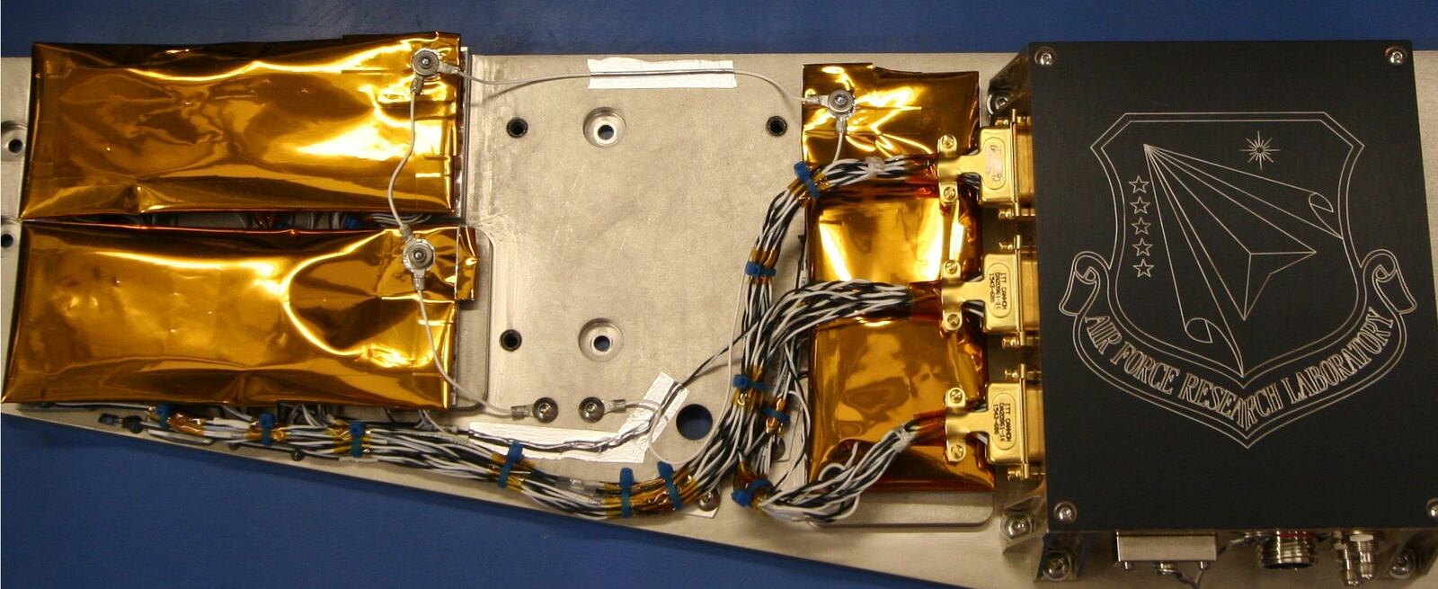 The Advanced Structurally Embedded Thermal Spreader, or ASETS-II,
Oscillating Heat Pipe experiment, developed at the Air Force Research
Laboratory Space Vehicles Directorate, to solve spacecraft thermal
challenges. (AFRL photo)