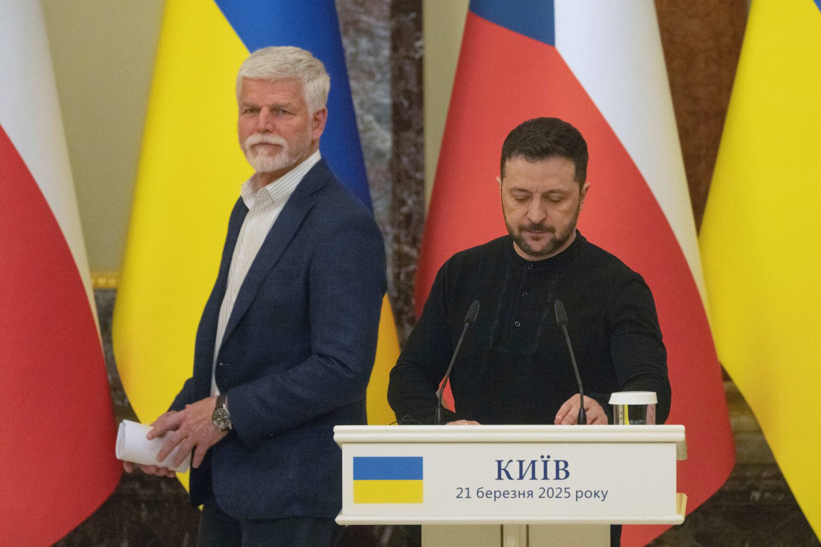 Ukrainian President Volodymyr Zelenskyy, right, and Czech Rebublic's President Petr Pavel arrive for a joint press conference in Kyiv, Ukraine, Friday, March 21, 2025. (AP Photo/Efrem Lukatsky).