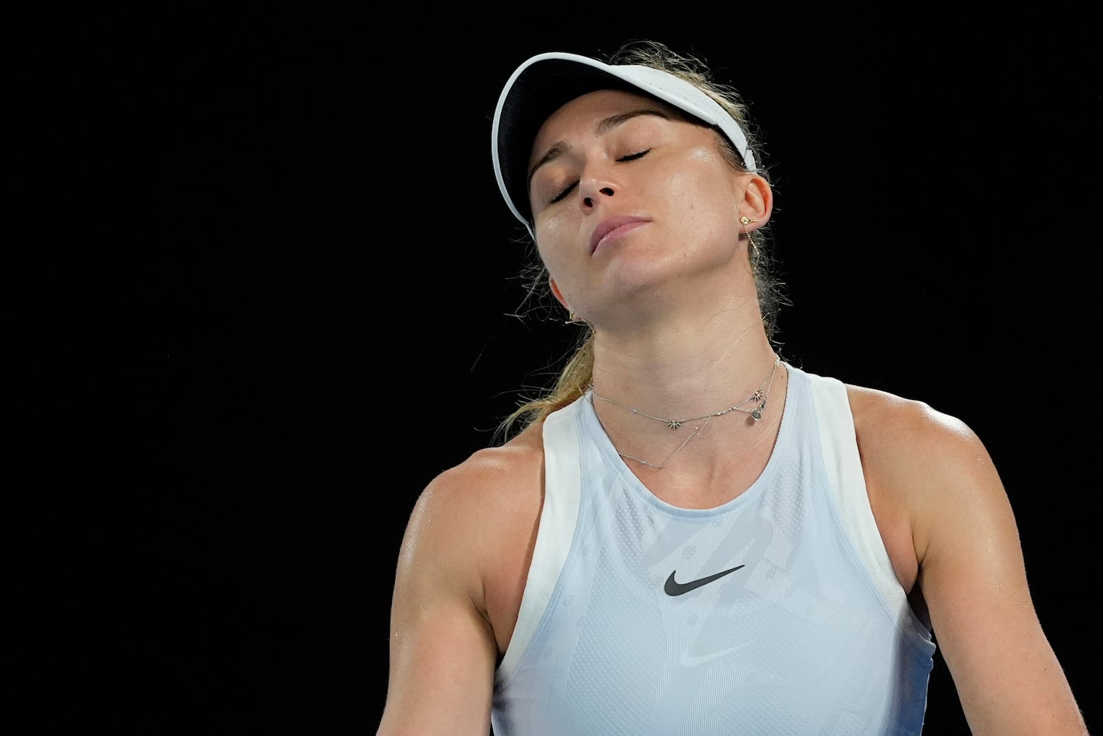 Paula Badosa of Spain reacts during her semifinal match against Aryna Sabalenka of Belarus at the Australian Open tennis championship in Melbourne, Australia, Thursday, Jan. 23, 2025. (AP Photo/Asanka Brendon Ratnayake)