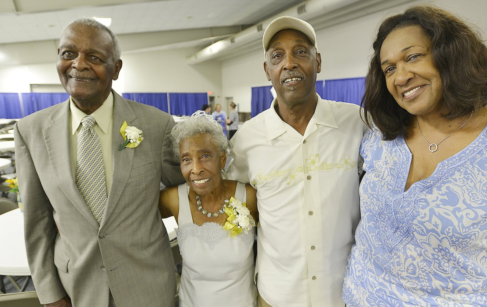 Bill and Hazel Carter, left, were the king and queen of the Golden Wedding Celebration in 2014 at the Clark County Fair for being married for 72 years. They are posing for a picture with their son, Bill, Jr., and his wife, Carol, who have been married for 52 years. Bill Lackey/Staff