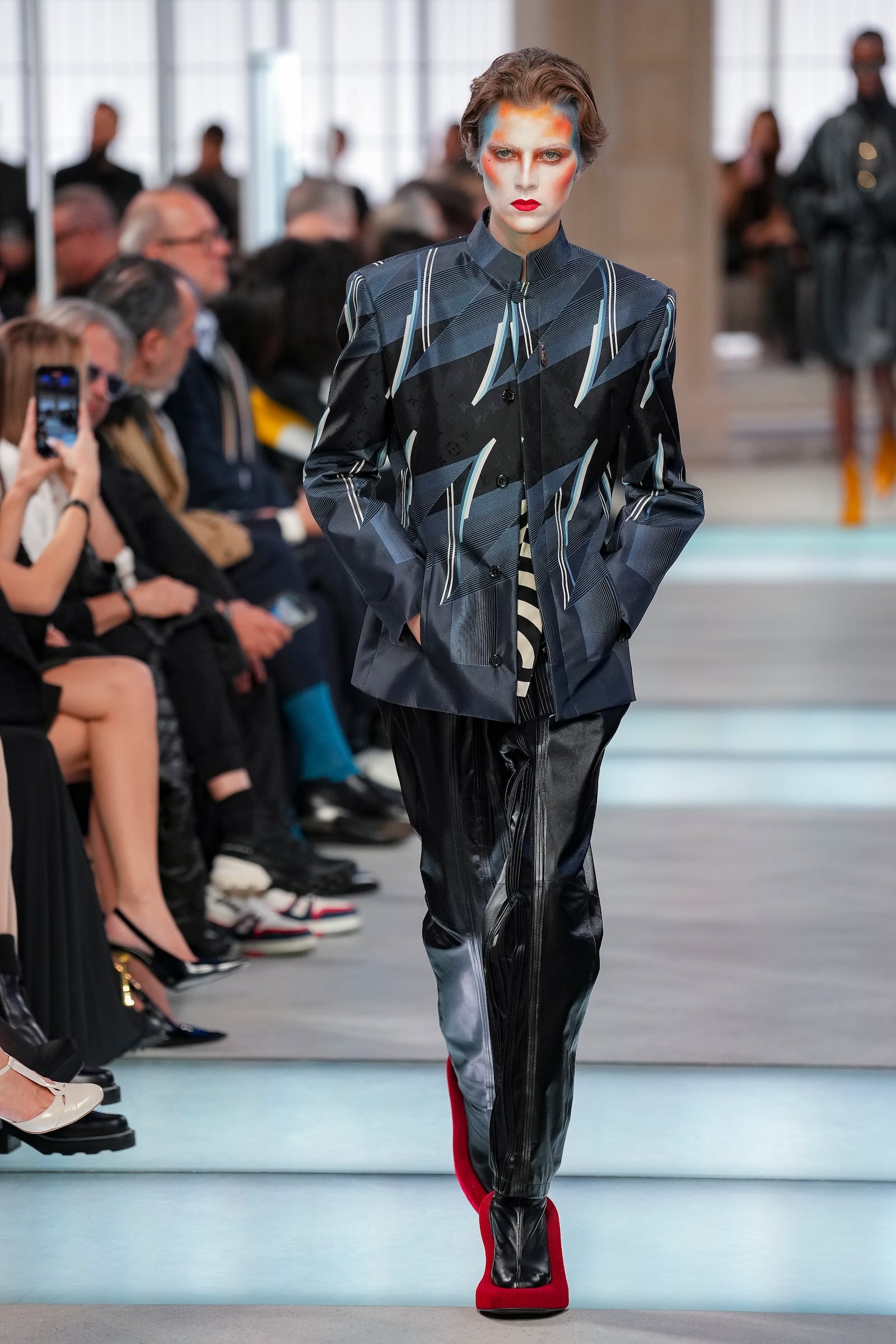 A model wears a creation as part of the Louis Vuitton Fall/Winter 2025-2026 Womenswear collection presented in Paris, Monday, March 10, 2025. (Photo by Scott A Garfitt/Invision/AP)