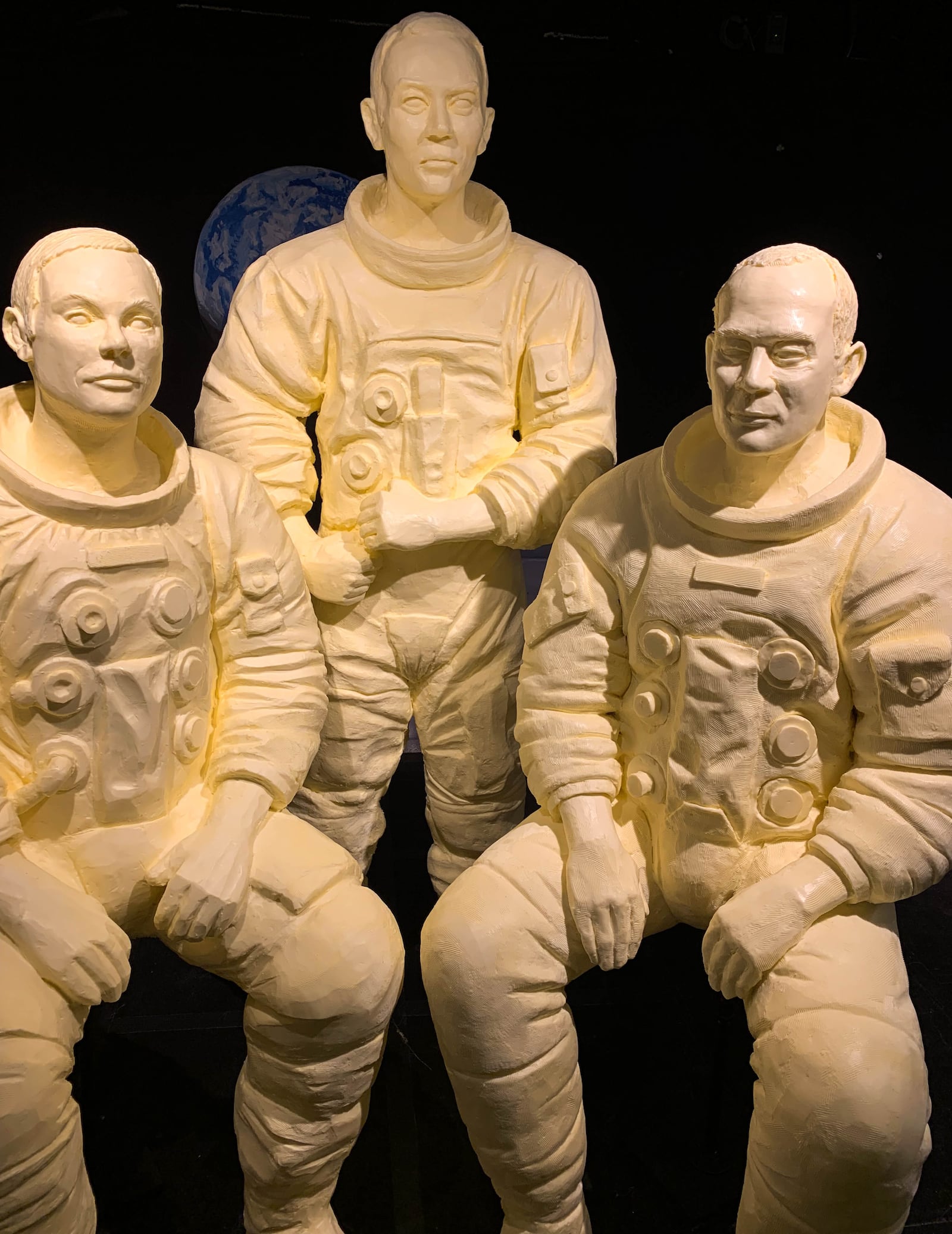 Full-scale models of the entire Apollo 11 crew, Neil Armstrong, Michael Collins and Buzz Aldrin, are sculpted in butter at the Ohio State Fair. CONTRIBUTED BY THE OHIO STATE FAIR