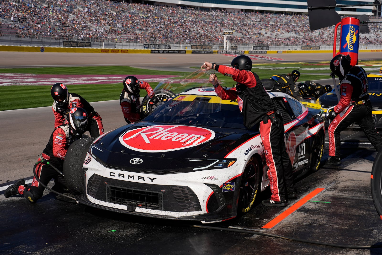 NASCAR Cup Series driver Joey Logano (22) makes a pit stop during a NASCAR Cup Series auto race Sunday, Oct. 20, 2024, in Las Vegas. (AP Photo/John Locher)