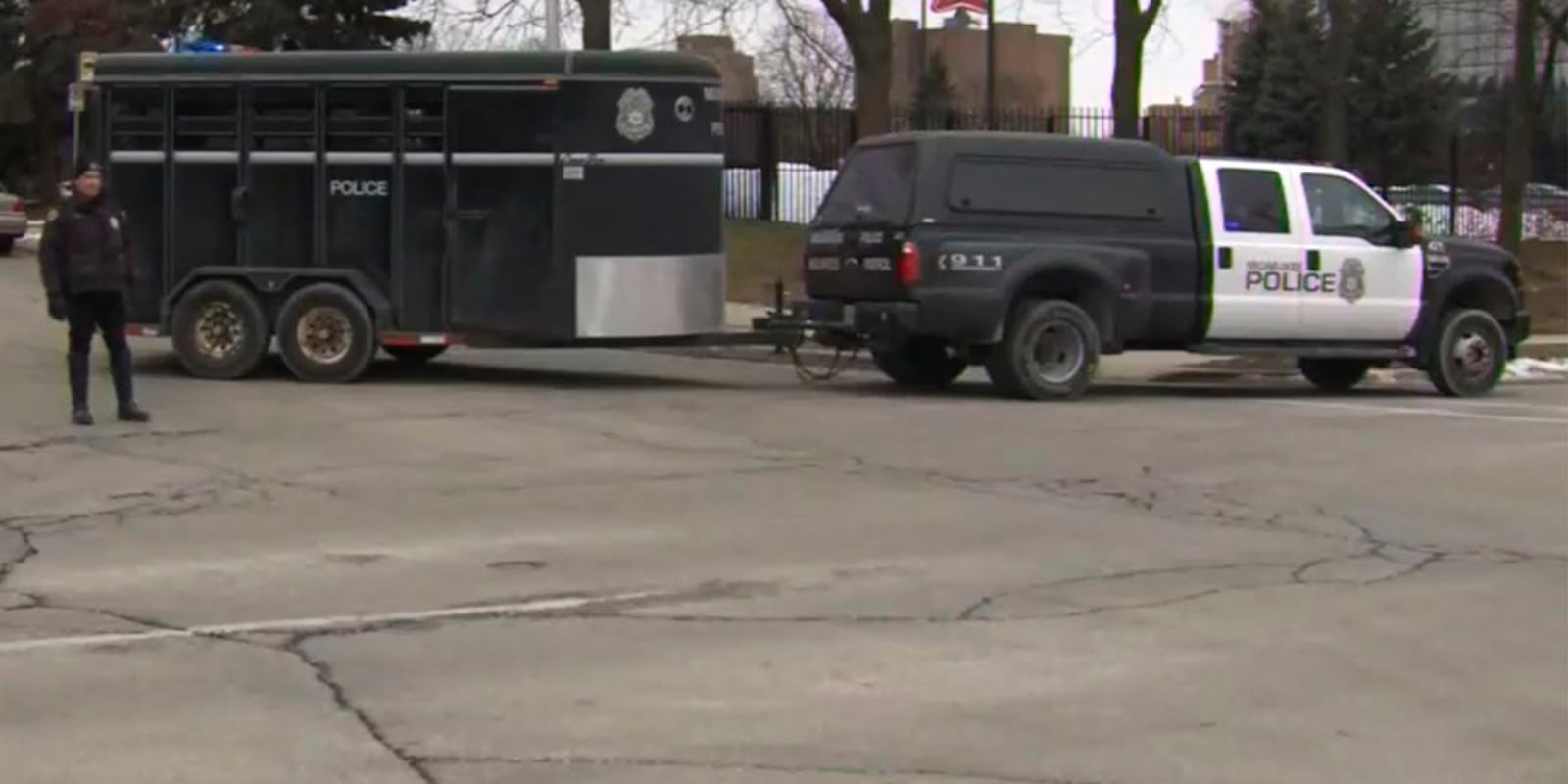 This image provided by WISN-TV, police respond to a possible shooting at the MillerCoors campus in Milwaukee on Wednesday, Feb. 26, 2020. WISN-TV in Milwaukee reported Wednesday that a MillerCoors employee received an email about an active shooter near one of the buildings. MillerCoors public relations confirmed to WISN that there was an incident.