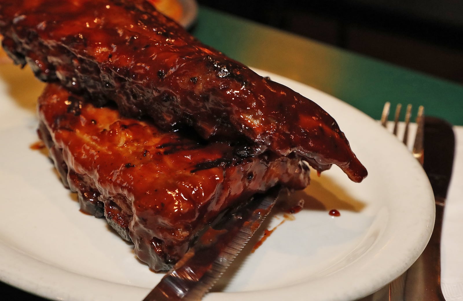 The Hickory Inn’s BBQ ribs. BILL LACKEY/STAFF