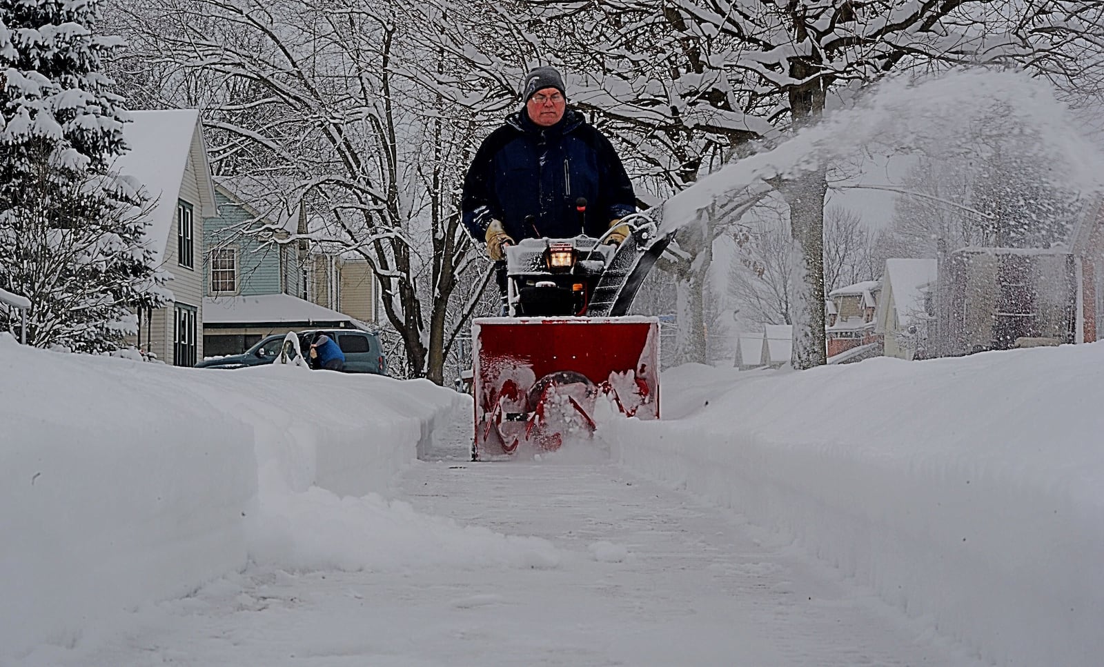 Sam Hook clears the sidewalks for most of his neighborhood in Jamestown. Hook has been doing this for many years, and says he takes no payment.