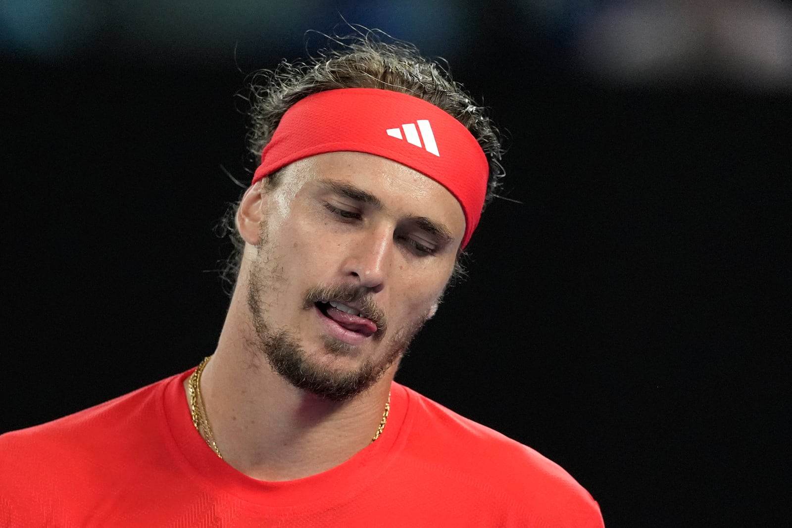 Alexander Zverev of Germany reacts during the men's singles final against Jannik Sinner of Italy at the Australian Open tennis championship in Melbourne, Australia, Sunday, Jan. 26, 2025. (AP Photo/Asanka Brendon Ratnayake)