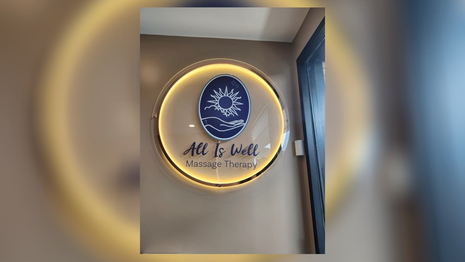 The sign at All Is Well Massage located in the 1300 building at the intersection of South Main Street (U.S. Route 68) and State Route 55 in Urbana. Contributed