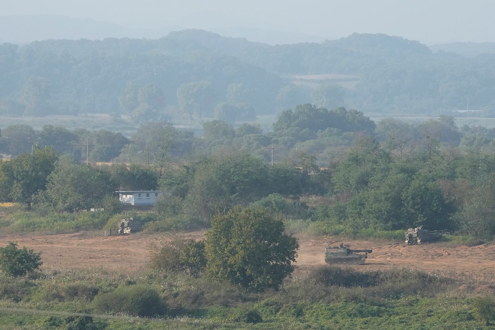 South Korean army K-9 self-propelled howitzers park in Paju, South Korea, near the border with North Korea, Thursday, Oct. 17, 2024. (AP Photo/Ahn Young-joon)