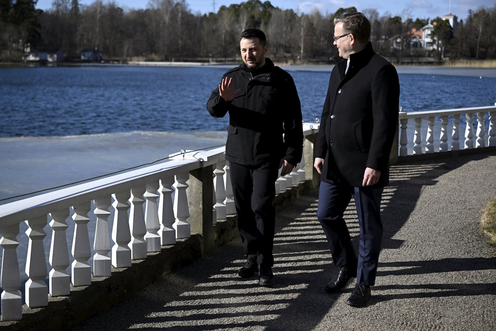 Finnish Prime Minister Petteri Orpo, right, and visiting Ukrainian President Volodymyr Zelenskyy talk at the Prime Minister's official residence Kes'ranta in Helsinki, Finland, Wednesday, March 19, 2025. (Antti Aimo-Koivisto/Lehtikuva via AP)